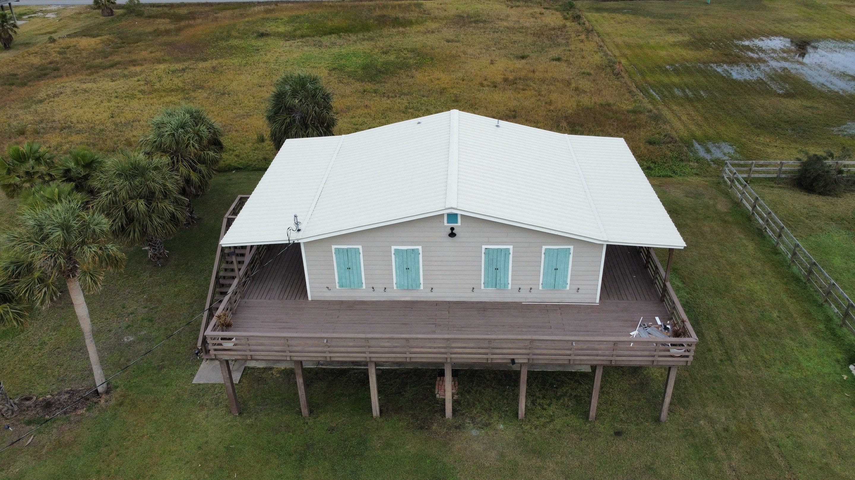 Residential Roofing Installation using R-Panel Metal Roofing on Galveston Island by Core Four Roofing