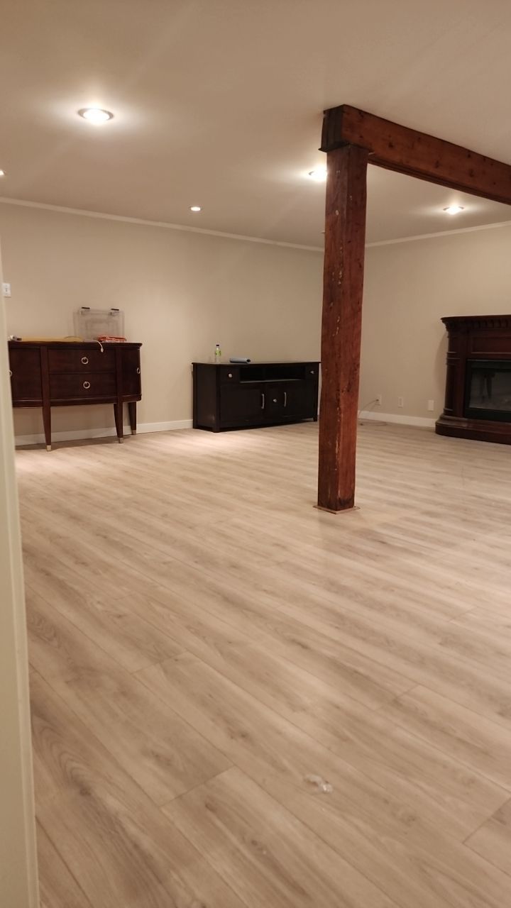 Basement finishing after flood by Eco-Nature Construction Inc.