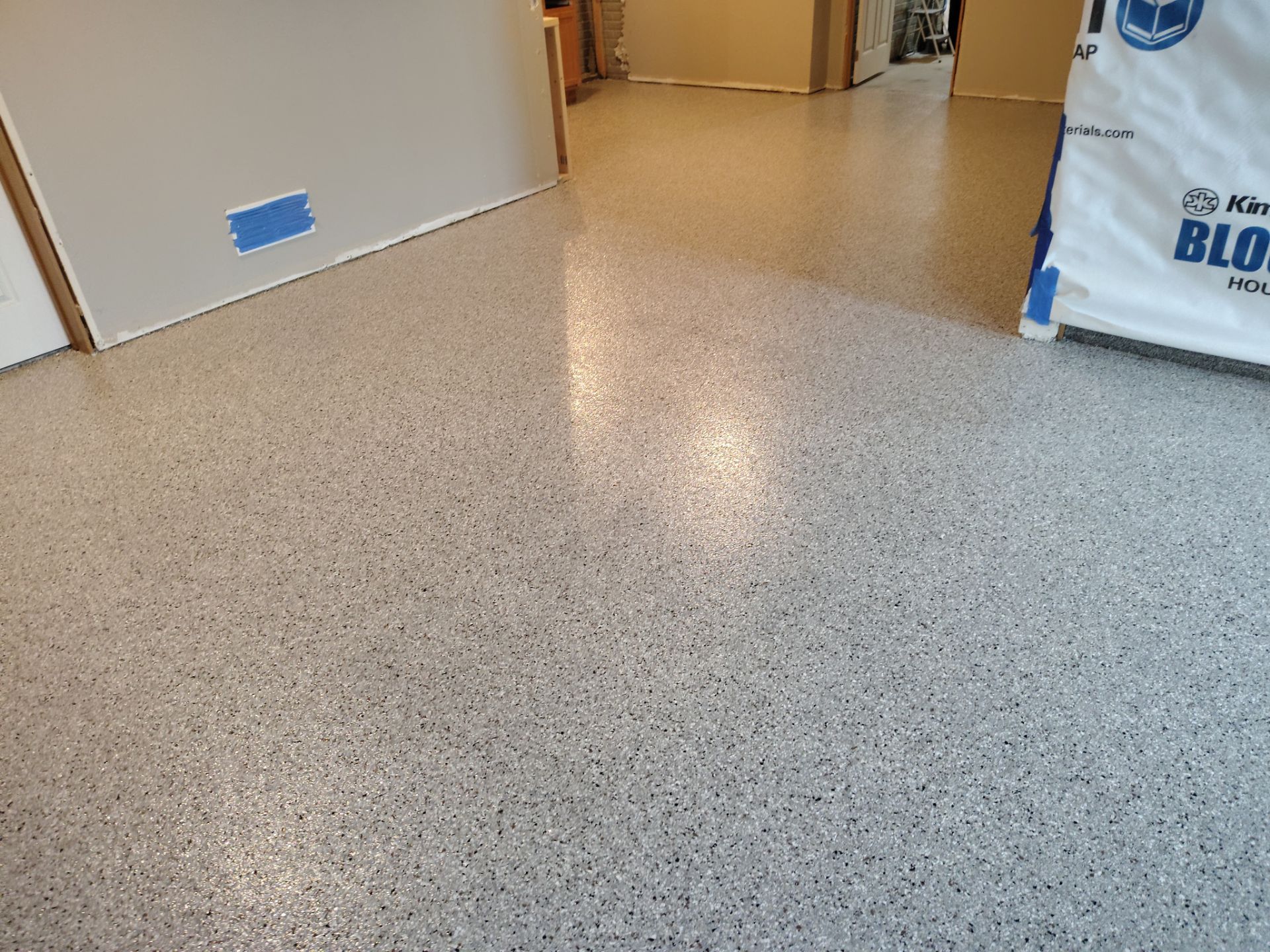 Maxwell, IA Coyote Flake Garage and Basement by Revival Concrete Coatings