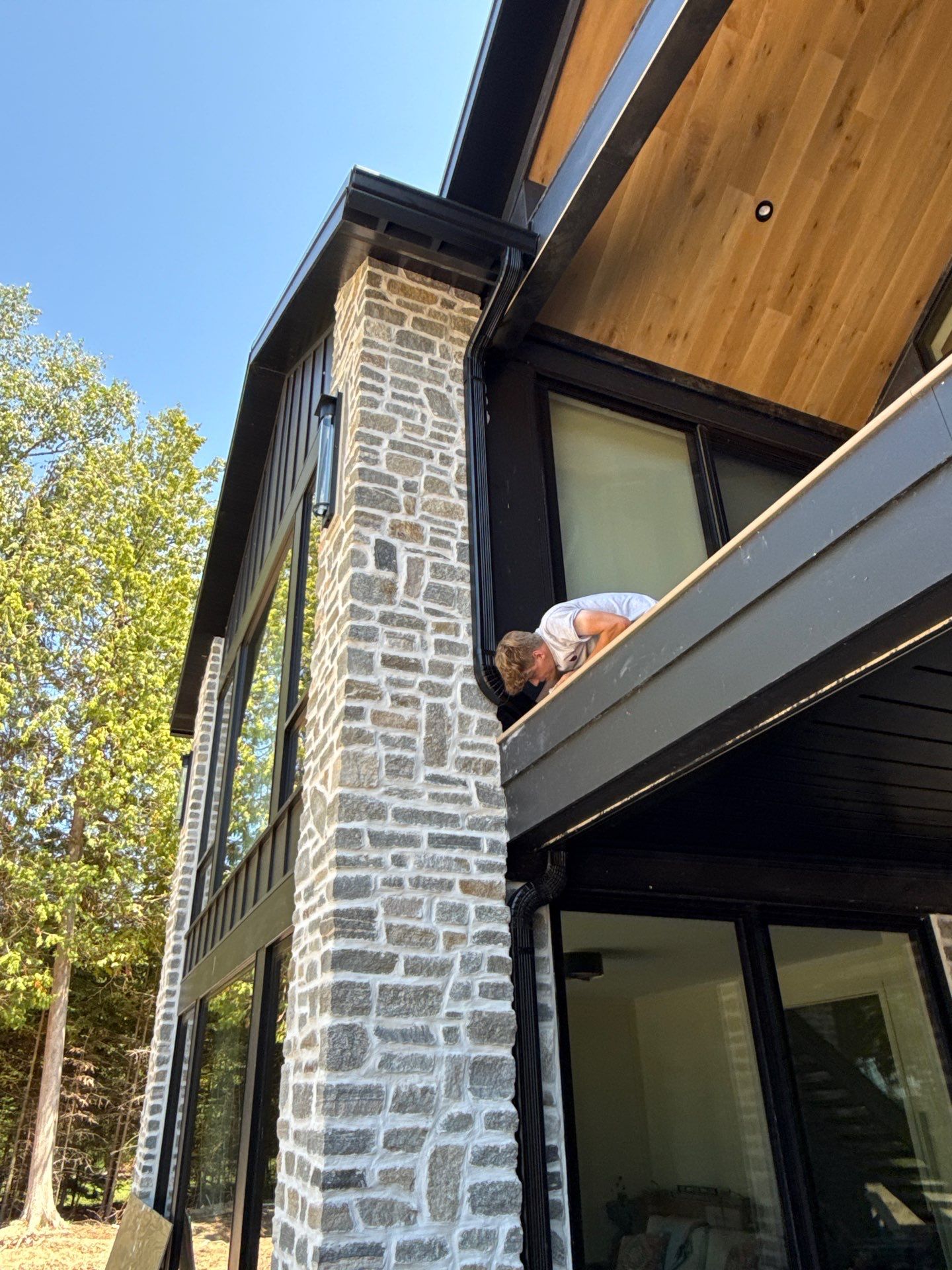 Gutter and Drainage System Installation for Modern Residential Build by Rainbow Seamless Systems