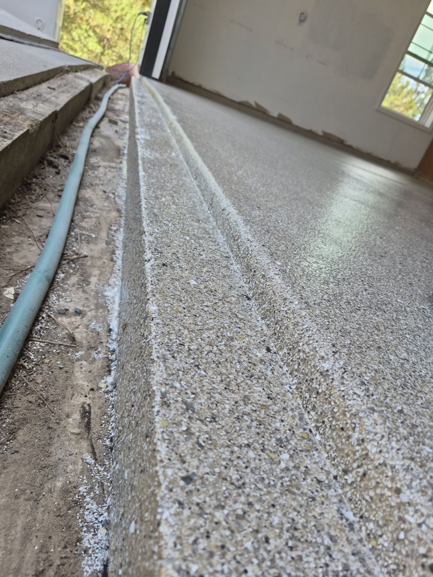 Spokane Garage Floor Transformation Using Hybrid Quartzite Flake by Croc Coatings, LLC