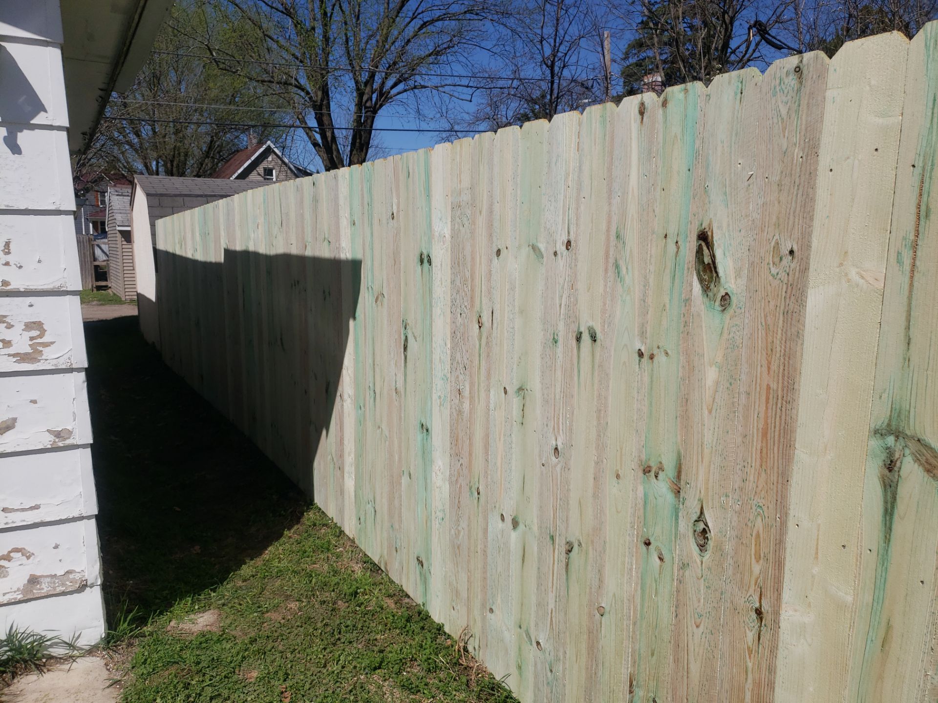 Pressure-Treated Wood Privacy Fence Replacement in Waterloo by Perfect Picket Fence and Stain