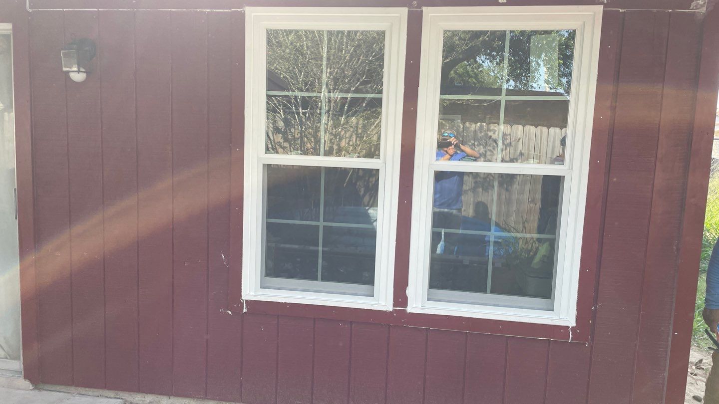 Black and white and red all over by Bayfront Roofing and Construction