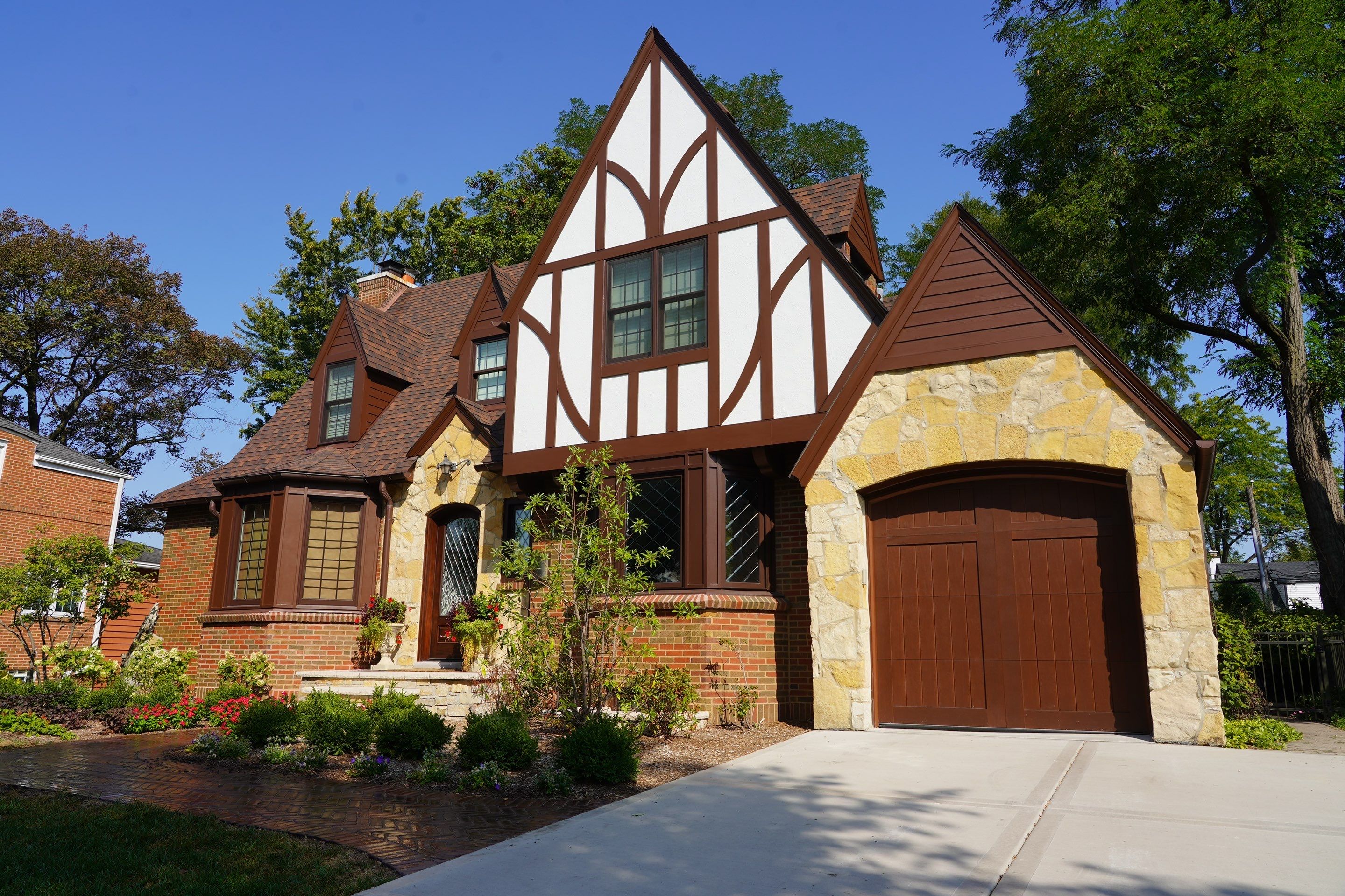 Tudor-Style Hardie Exterior Renovation in Elmhurst by Great American Exteriors