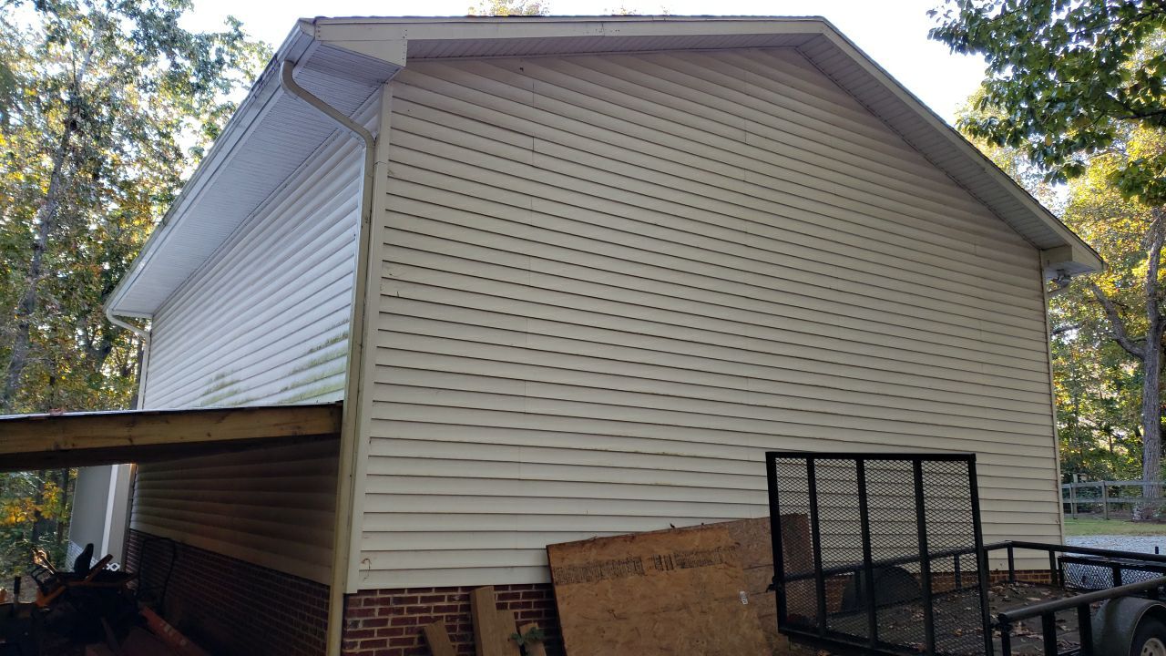 House Wash using cleaner by Power Wash Masters LLC