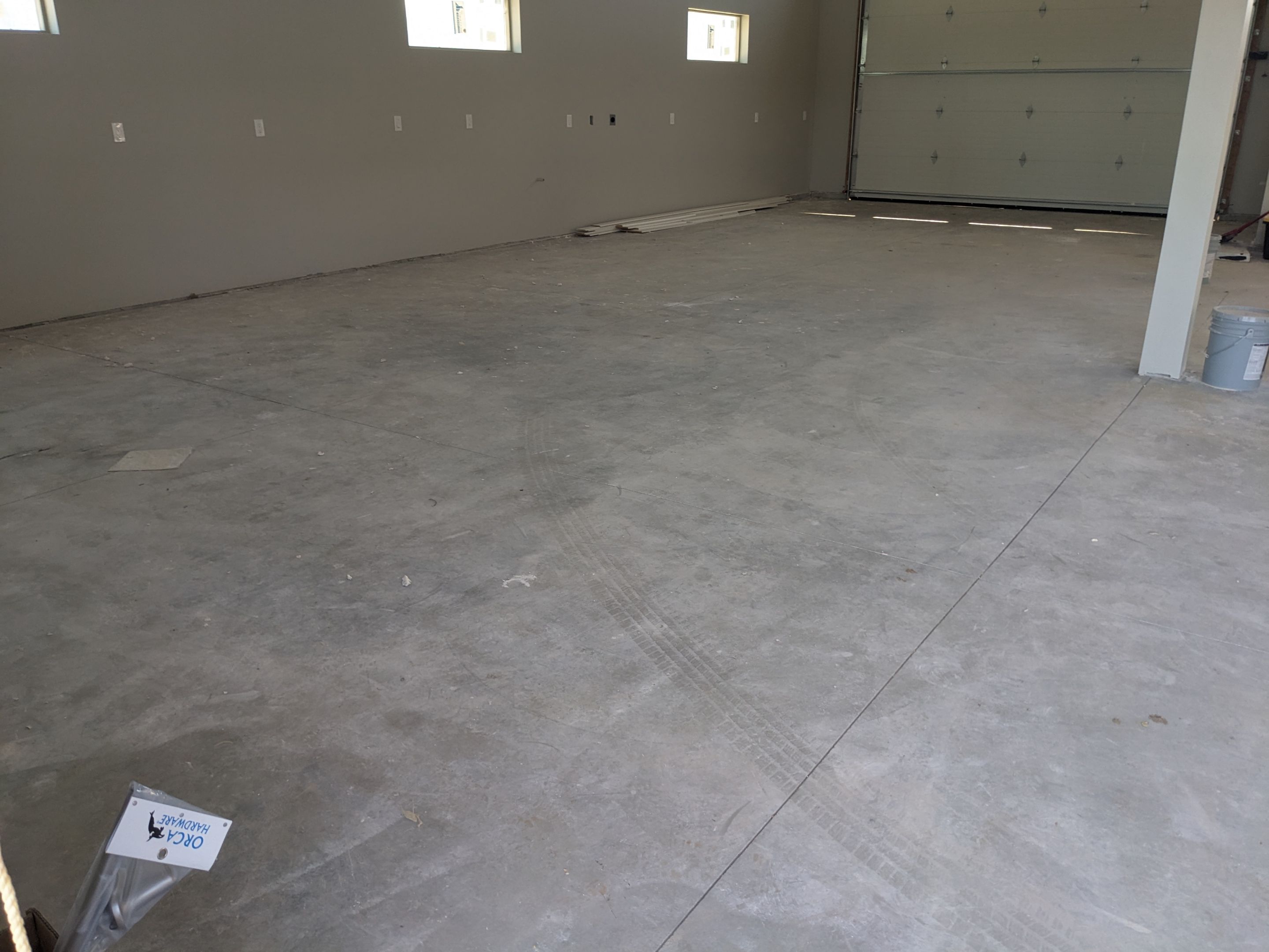 Garage Transformation using Domino by Croc Coatings, LLC