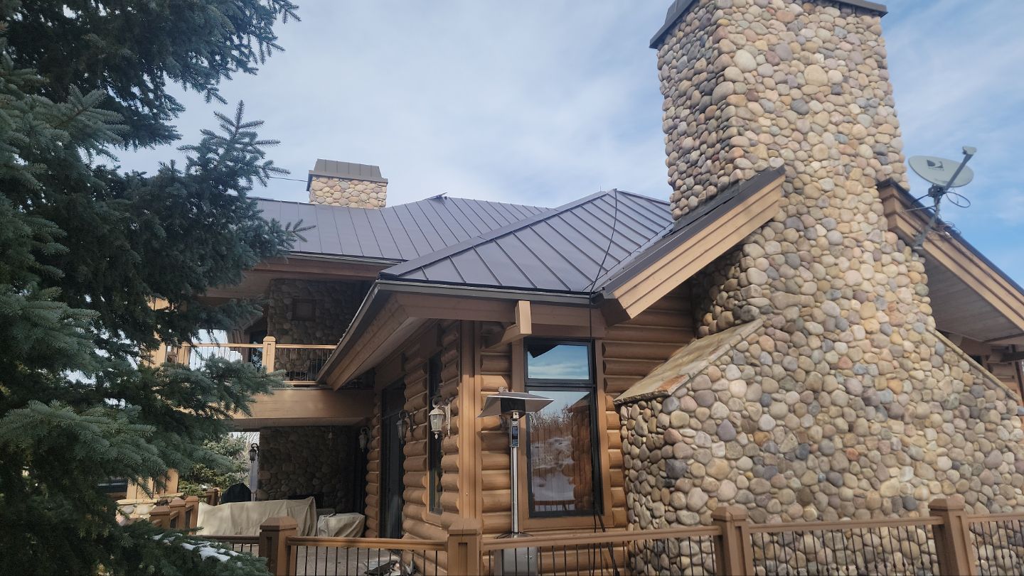 Standing Seam Metal Roof Replacement After Snow Damage by ASAP Roofing & Restoration