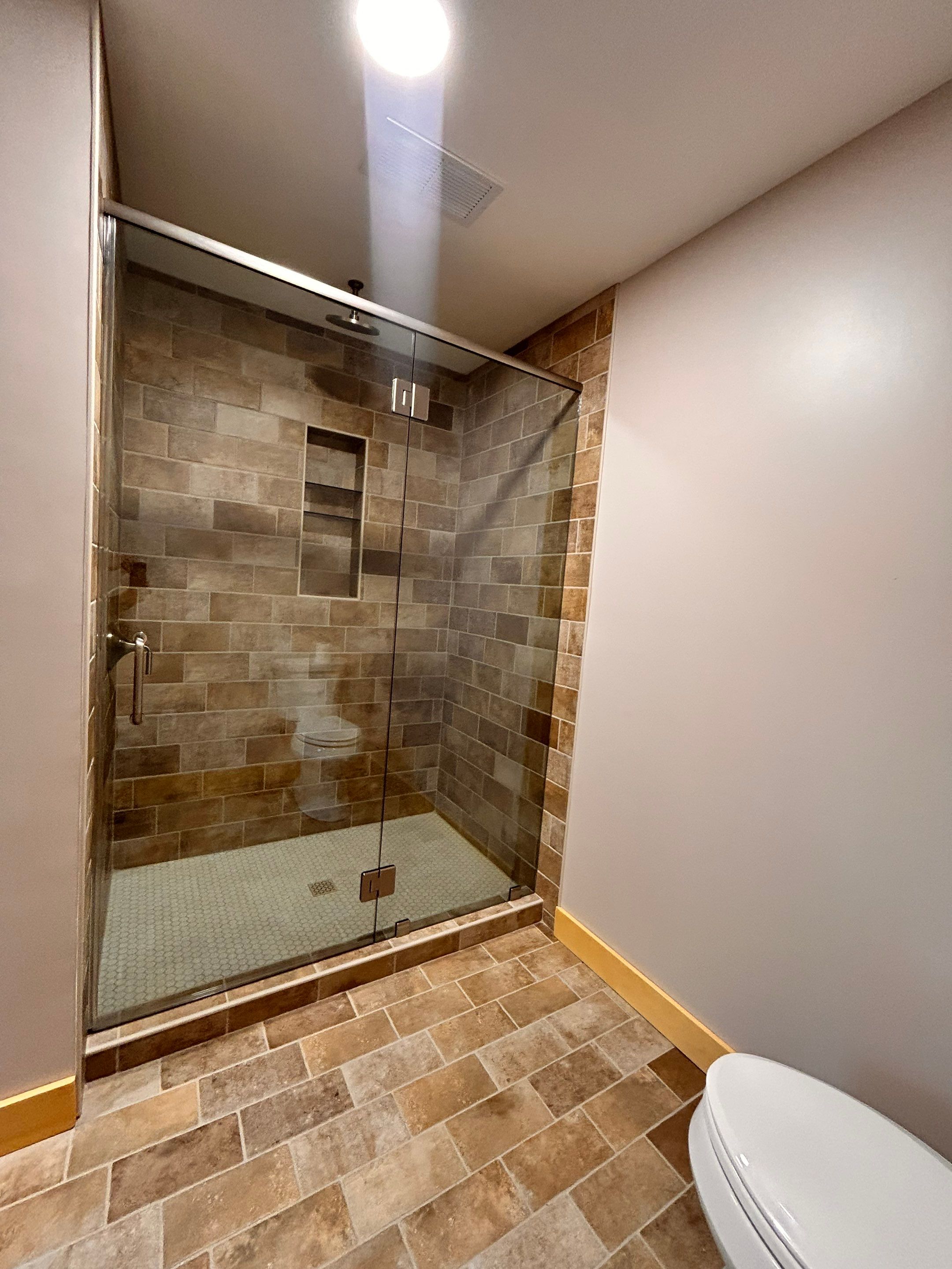 Bathroom Remodel using Tempered Shower Glass by Cheshire Glass Company