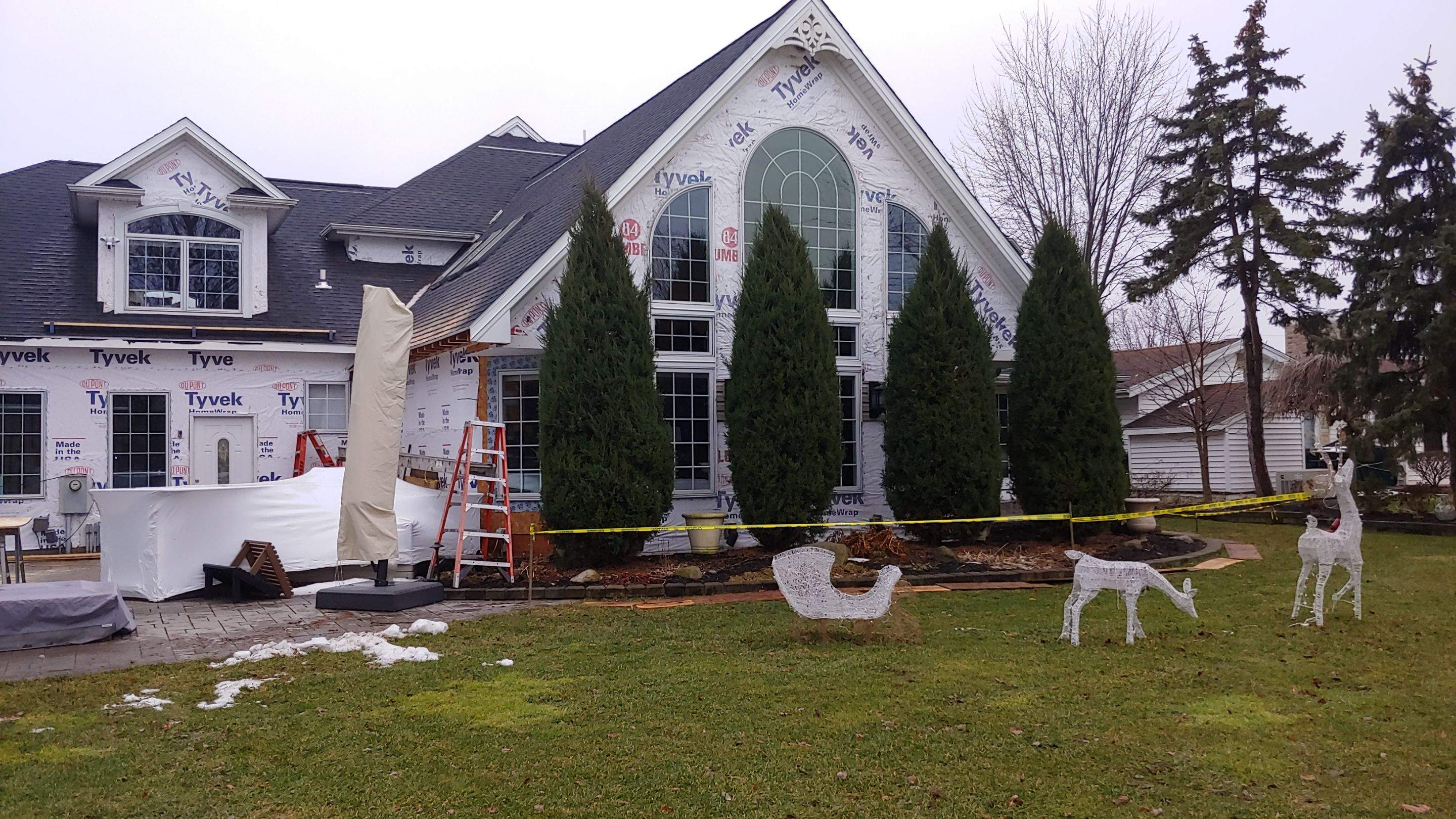 Exterior Renovations- Siding, Concrete, Railings, and Entry Door  by Ivy Lea Construction