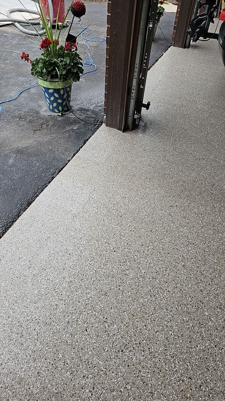 Garage Floor Polyaspartic Coating with Pebble Beach 1/4" Flakes by Croc Coatings, LLC