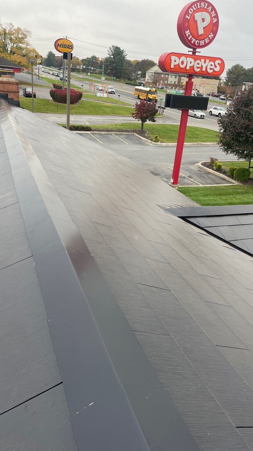 Tesla Solar Roof on a Commercial Building by American Home Contractors
