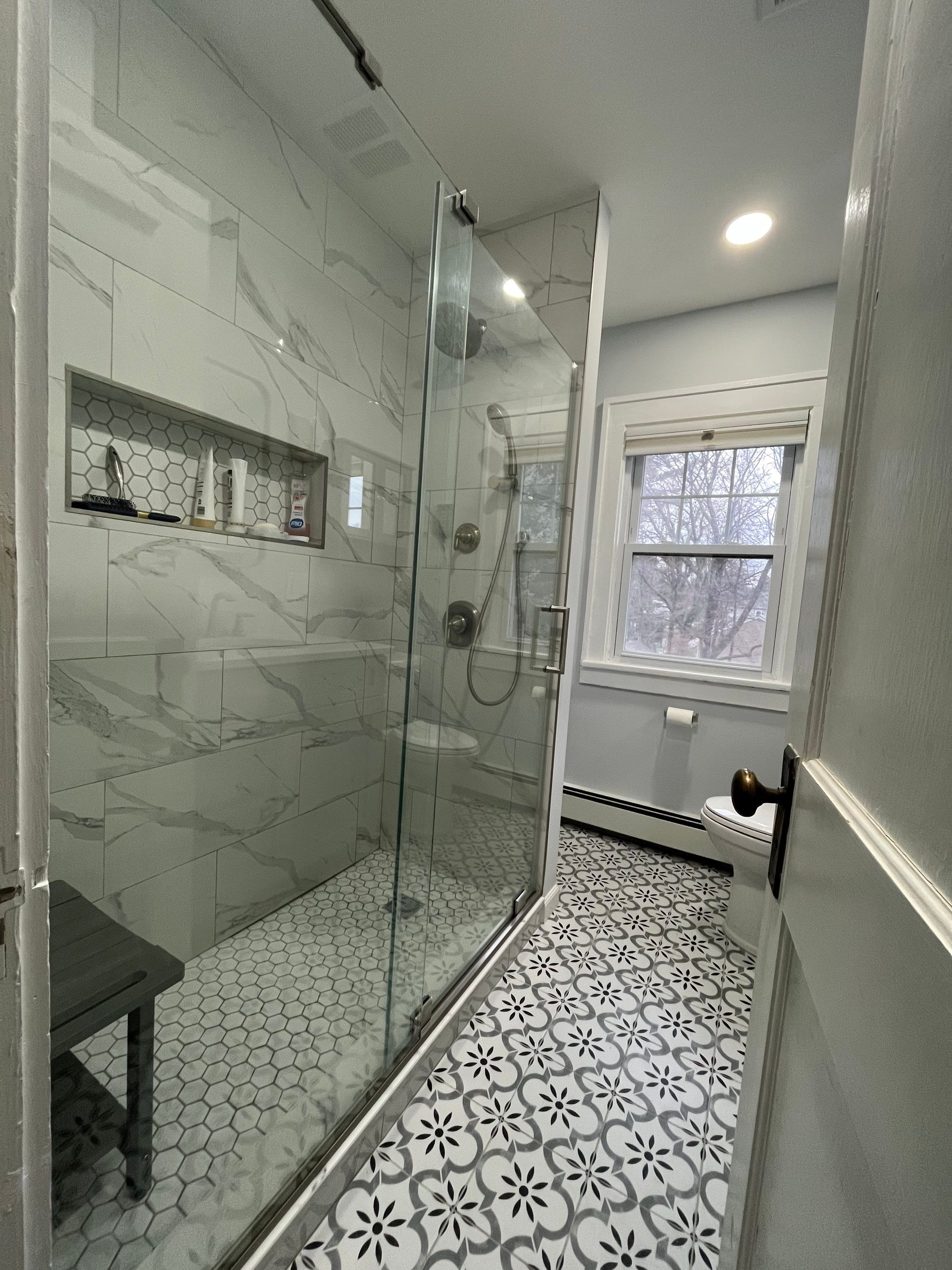Bathroom Remodel using Tile by Home Concepts Construction