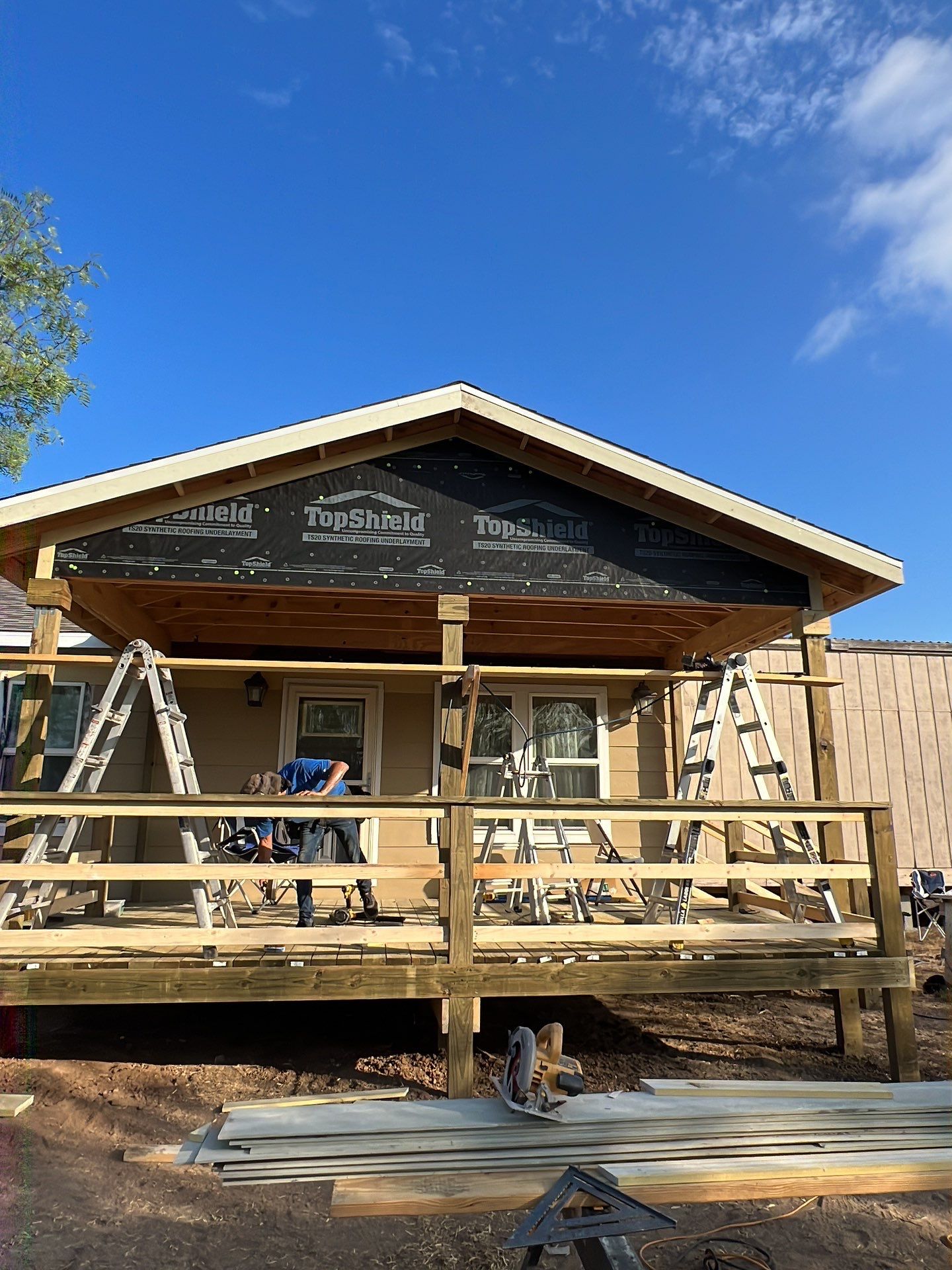 Front Porch Sitt'n by Bayfront Roofing and Construction