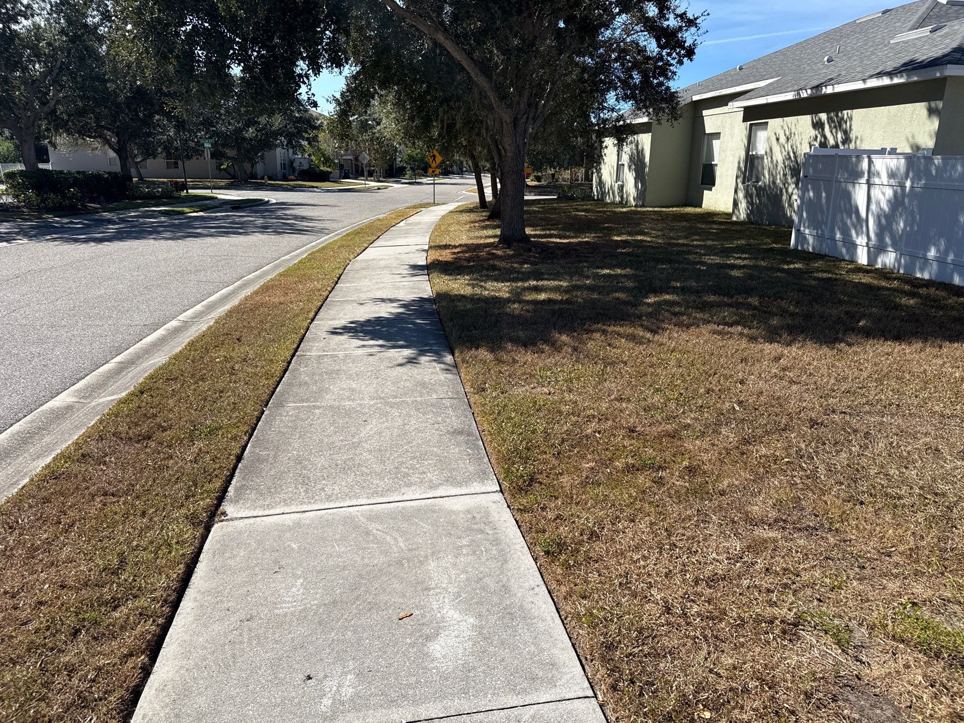 Driveway & Sidewalk Cleaning Transformation | Kingsfield Lakes, Parrish FL by Sunshine AquaWash