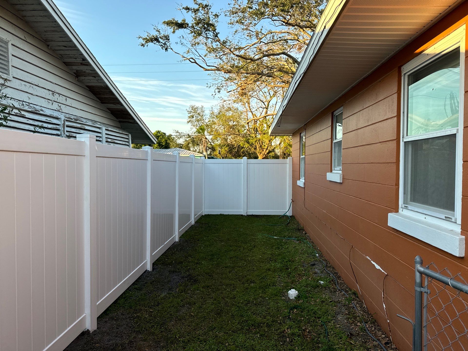 Vinyl Fence Installation using 6Ft White Vinyl Privacy Fence and a 4Ft White Vinyl Picket Fence by Asap fence and gates, LLC