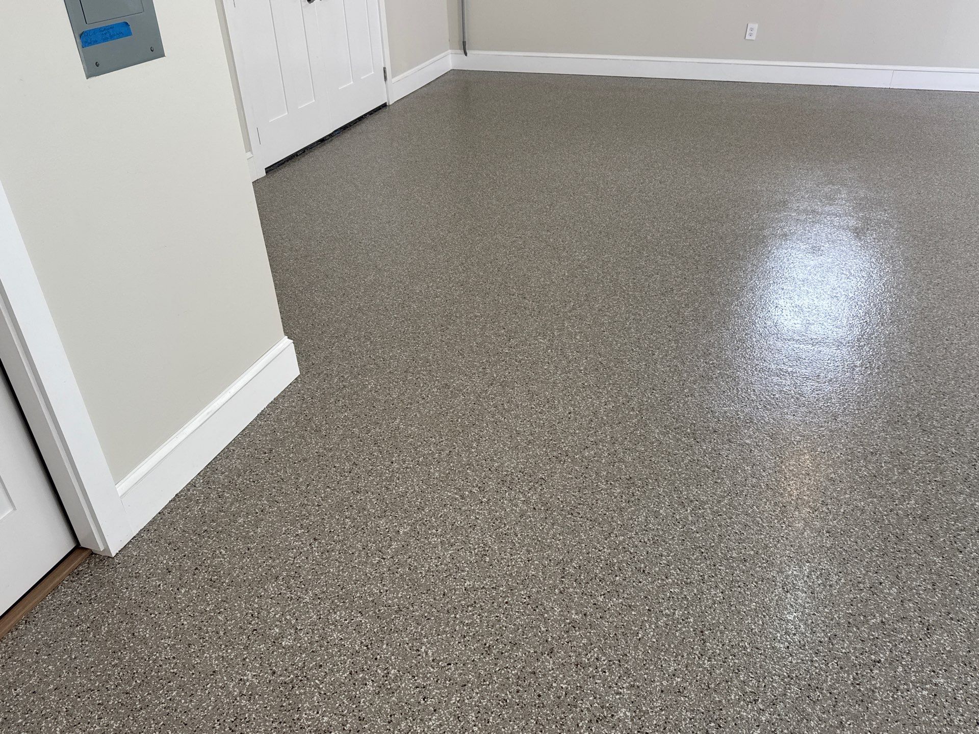 Garage and Sidewalk Project in Keystone Heights, FL in Pebble Beach by Cross Creek Concrete Coatings