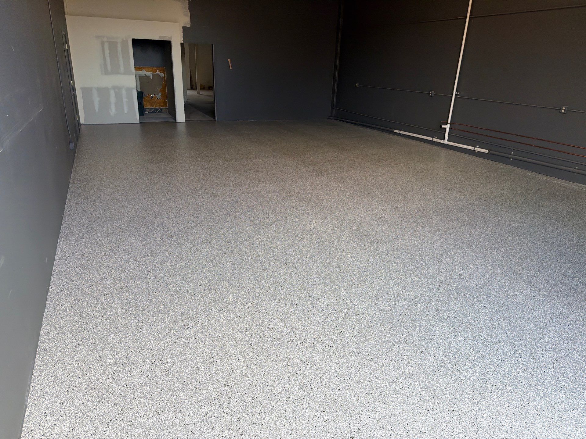 Custom Chip Polyurea Floor Coating for San Luis Obispo Commercial Unit by MGP Coatings