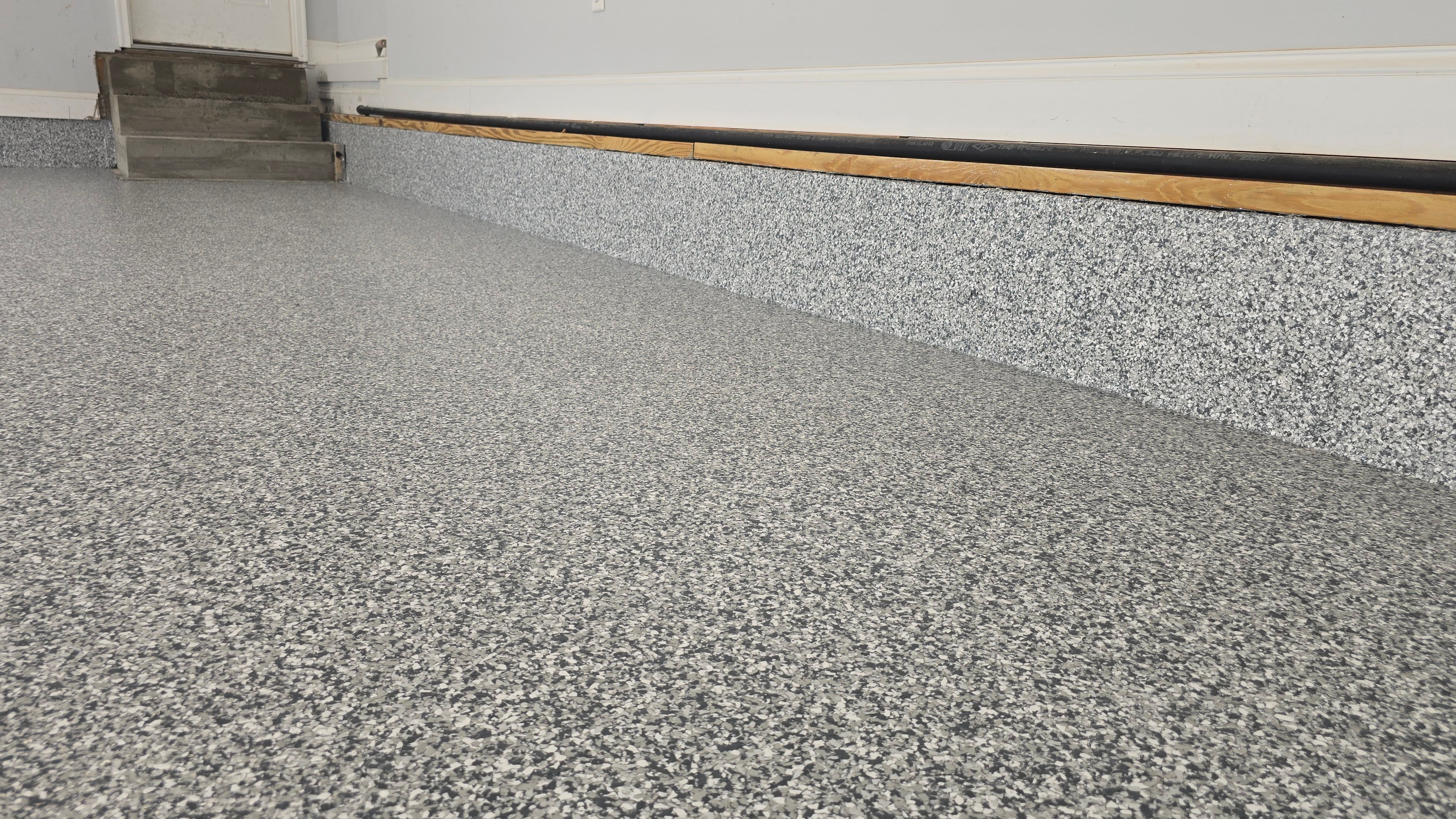 Garage using Gravel by Elite Floor Solutions