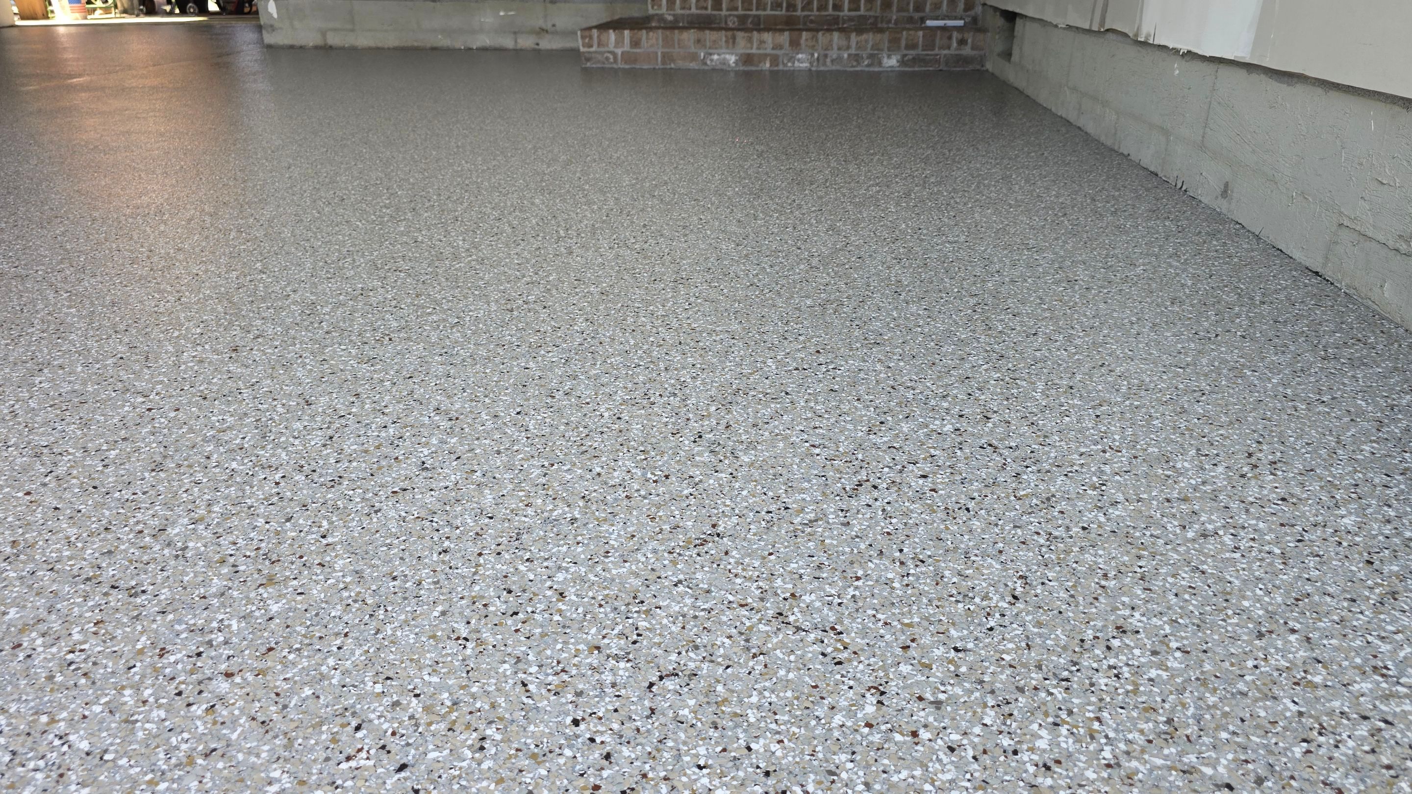 Garage Using Creekbed by Elite Floor Solutions