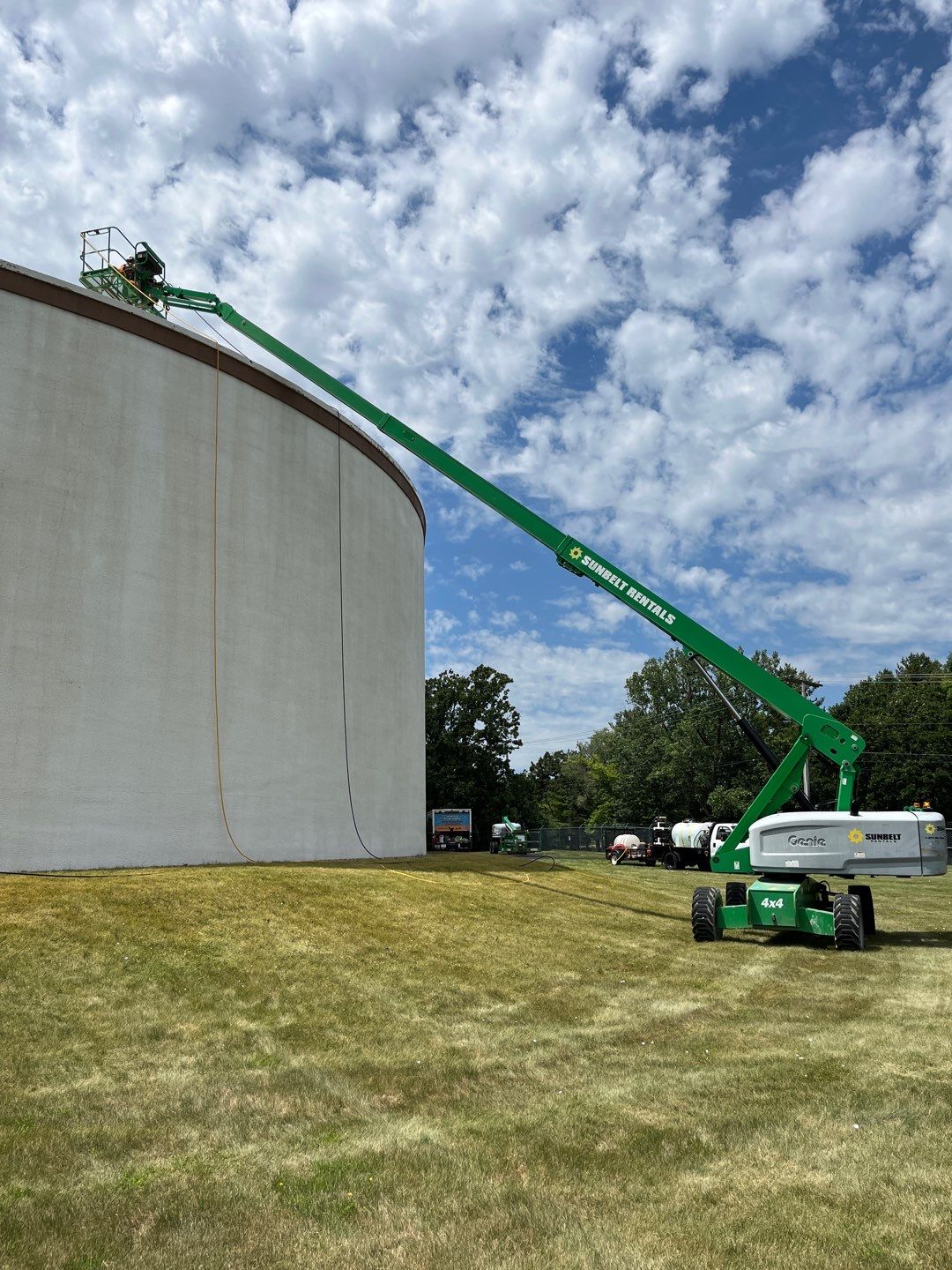 Water tank cleaning by Northern Power Washing LLC.