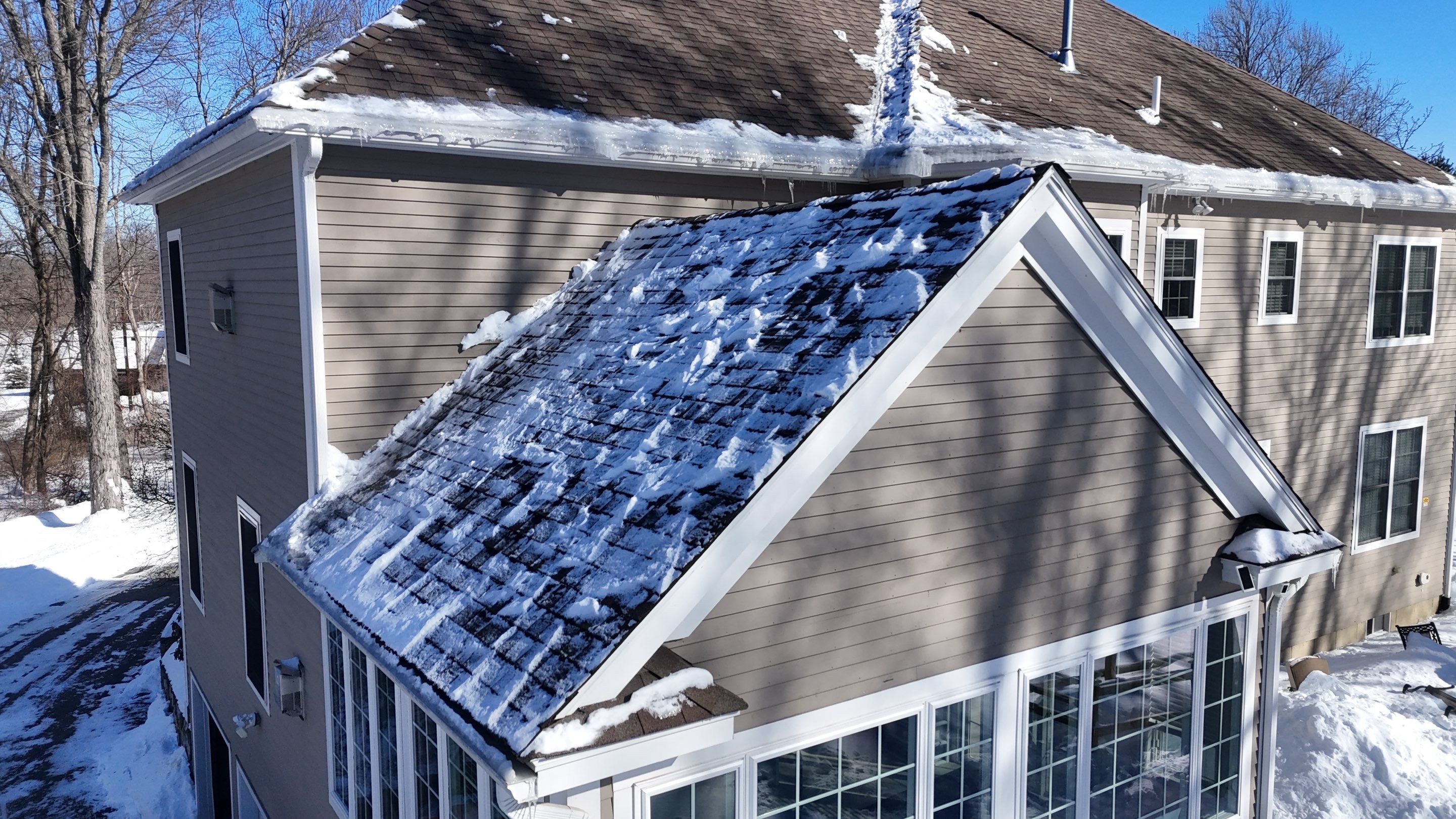 Ice Dam Removal Project in North Andover by Mighty Dog Roofing of Greater Middlesex County