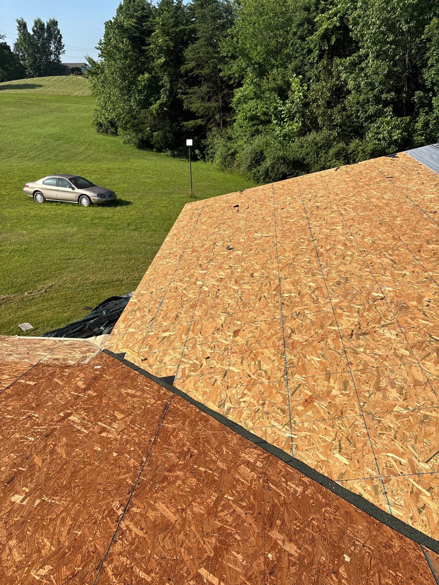 Residential Roofing Installation using GAF Timberline HDZ Barkwood by Rainstoppers Roofing