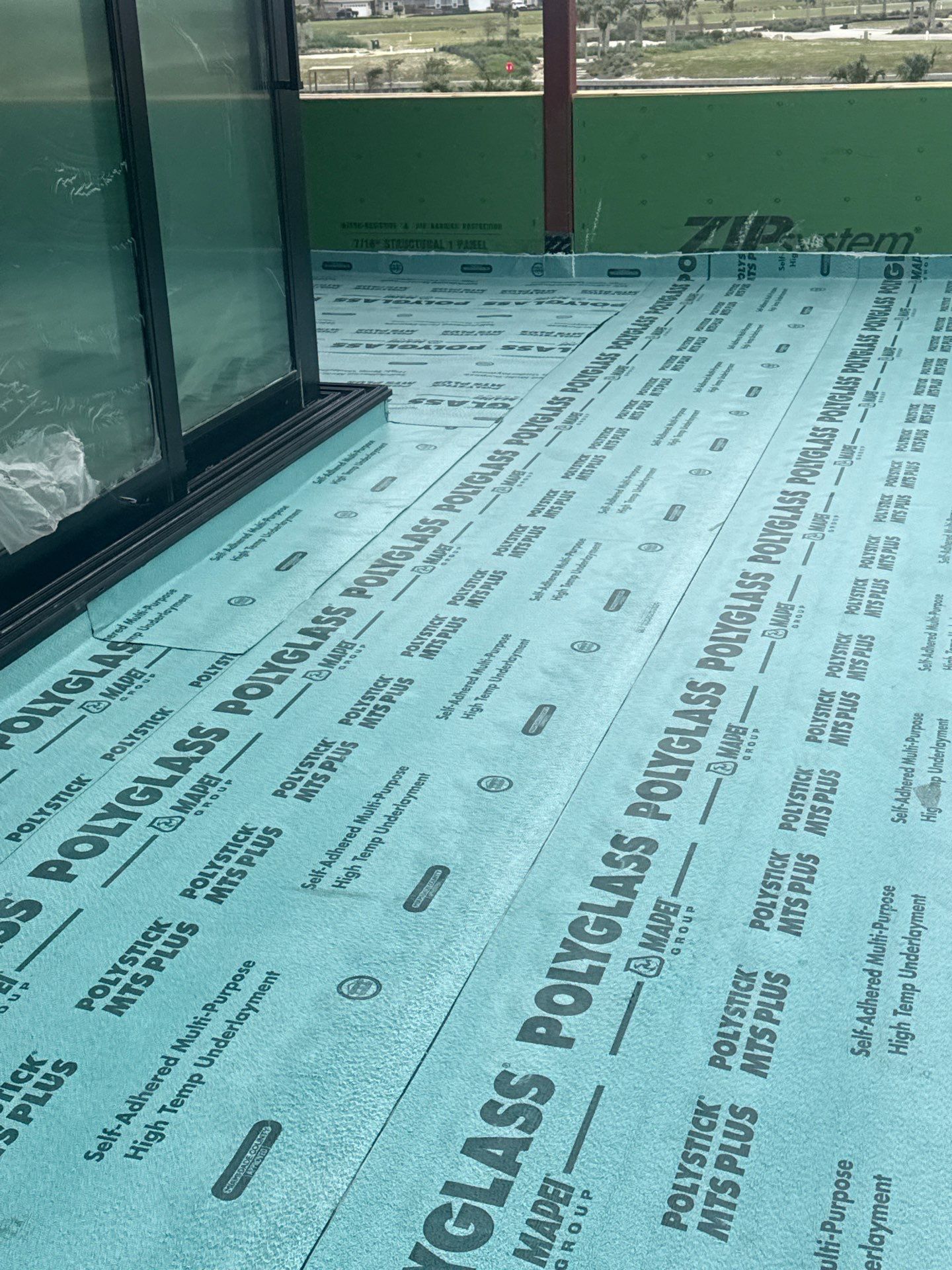 Walk Out, Island Style by Bayfront Roofing and Construction