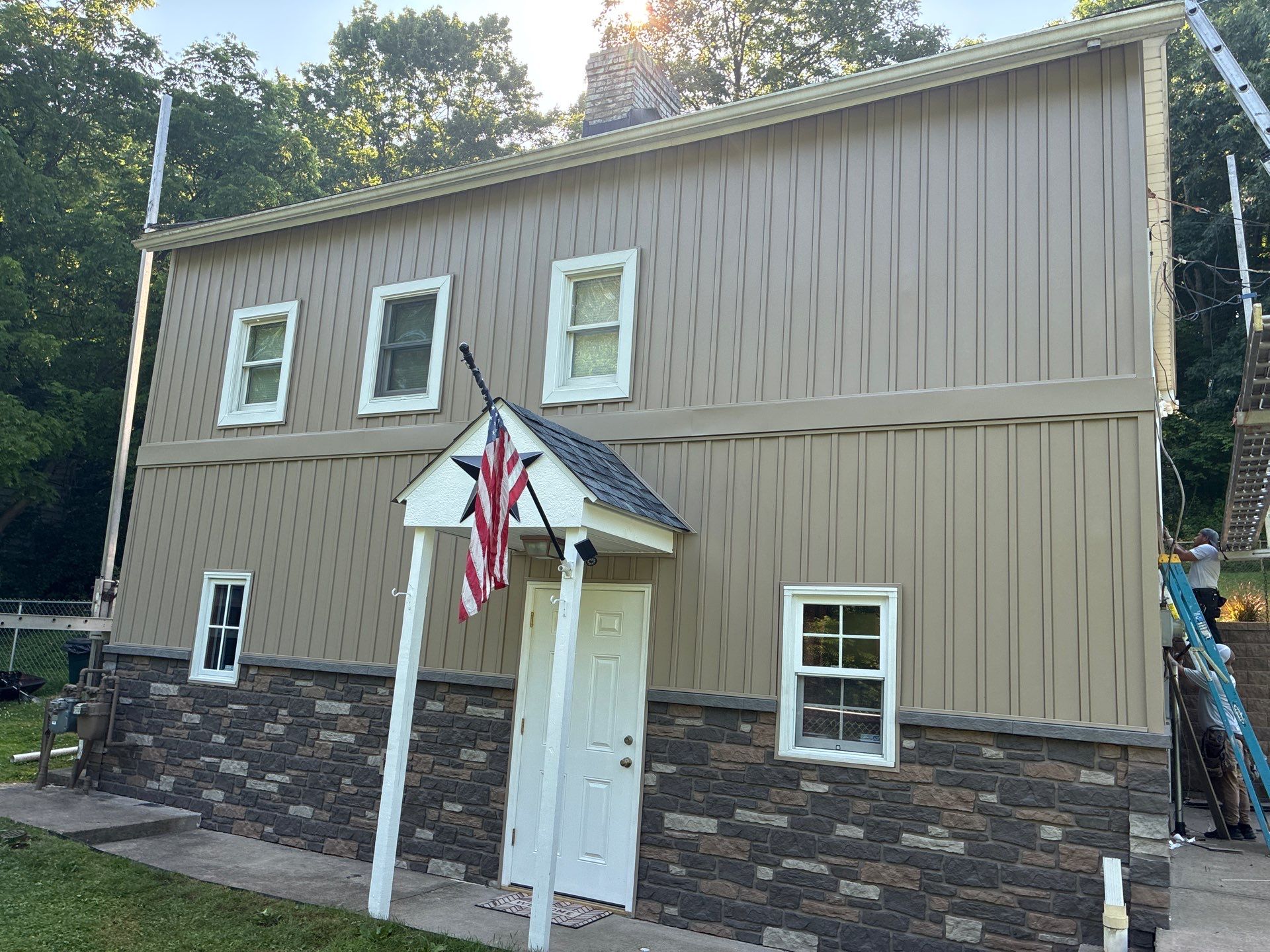 Jefferson Hills Vertical Board and Batten Siding and TandoStone Renovation by Ideal Siding Pittsburgh