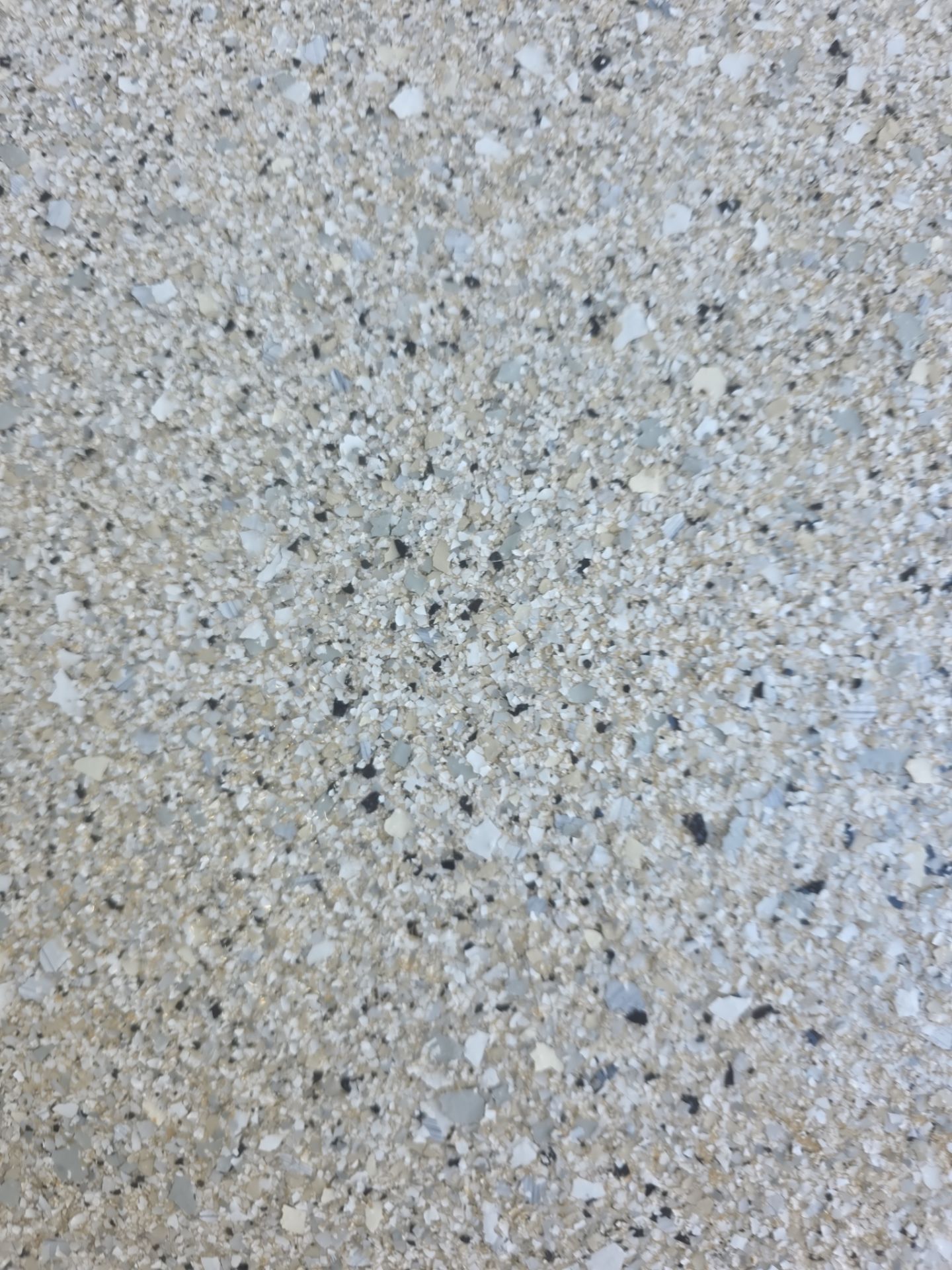 Limestone Hybrid Polyaspartic Garage Floor Coating in Coeur D’Alene by Croc Coatings, LLC