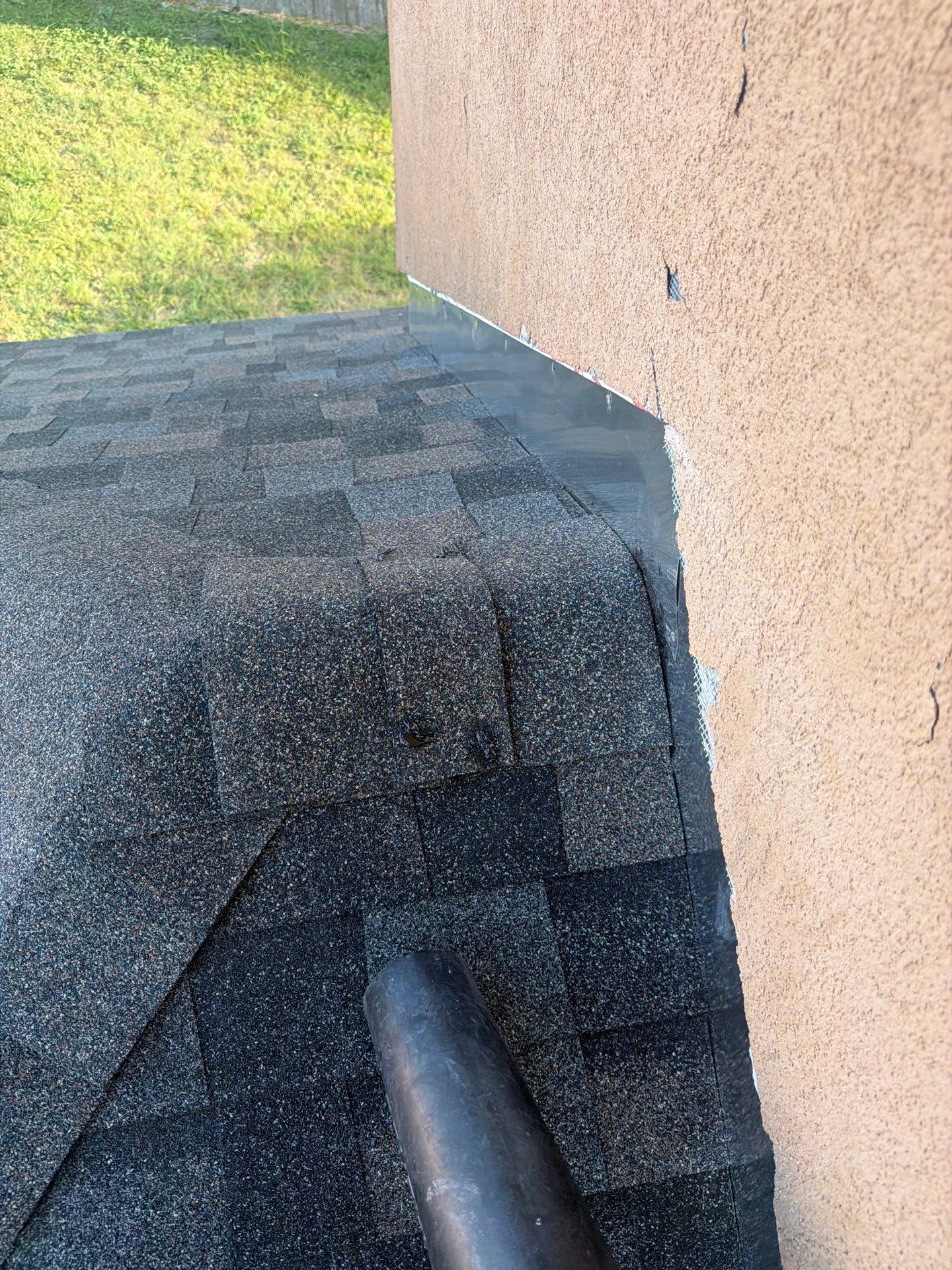 Flashing Stucco above the Roof by Bayfront Roofing and Construction