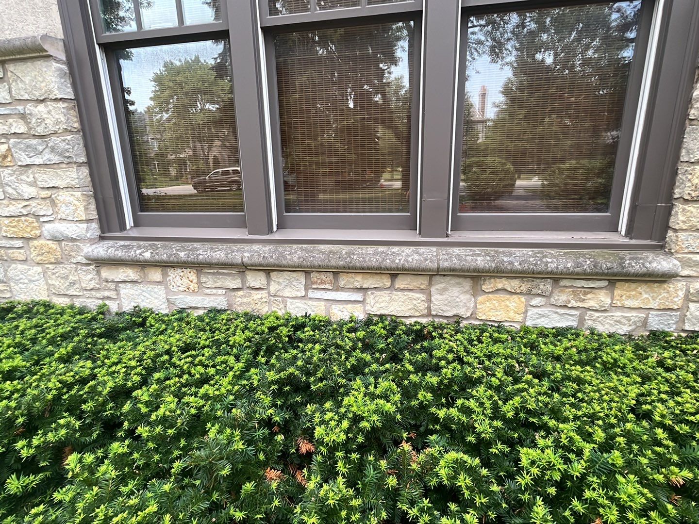Northbrook, IL stucco home soft wash and stone cleaning by Northern Power Washing LLC.