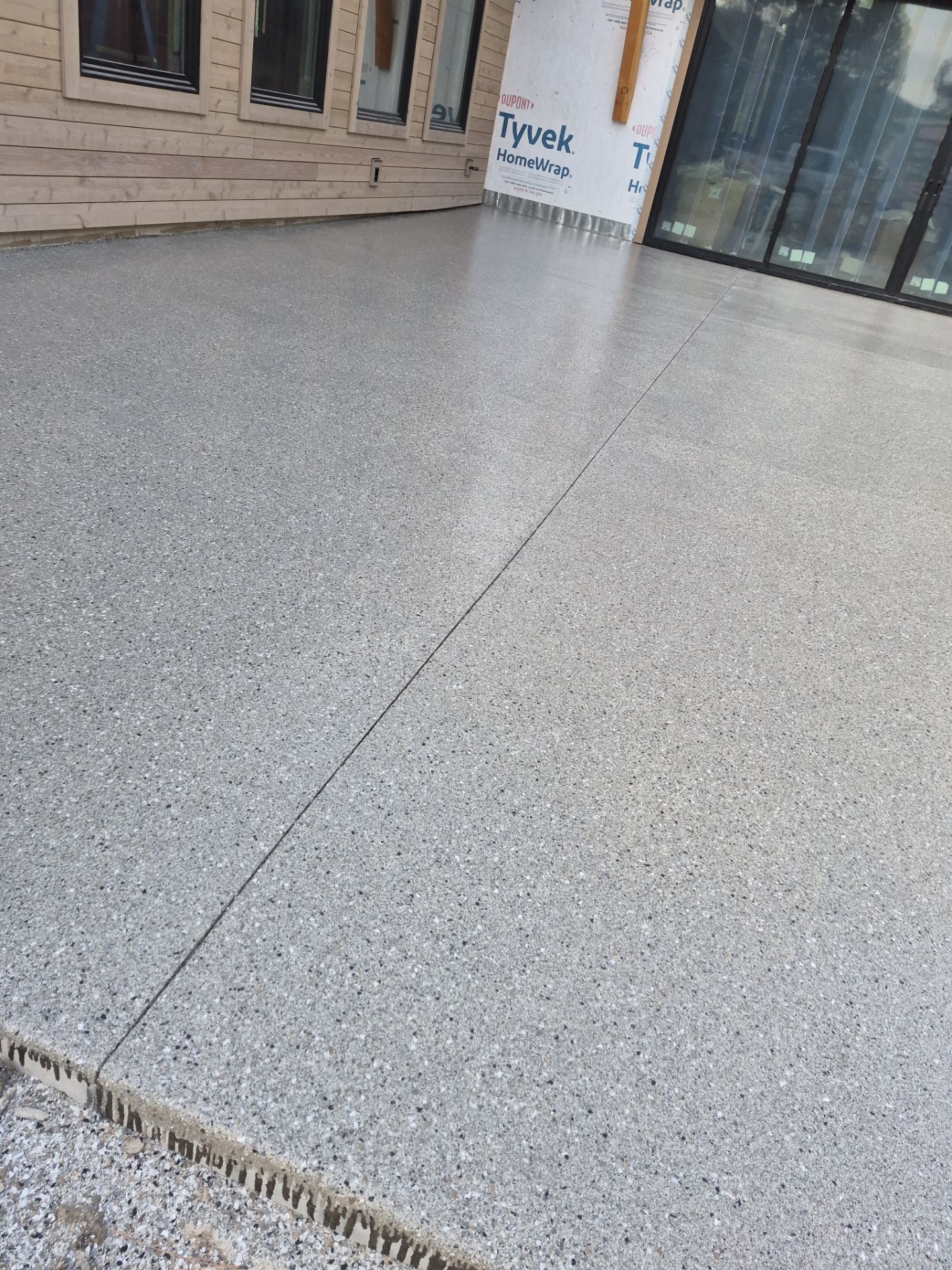 New Construction Concrete Patio and Garage Polyurea Floor Coating in Dover by Croc Coatings, LLC