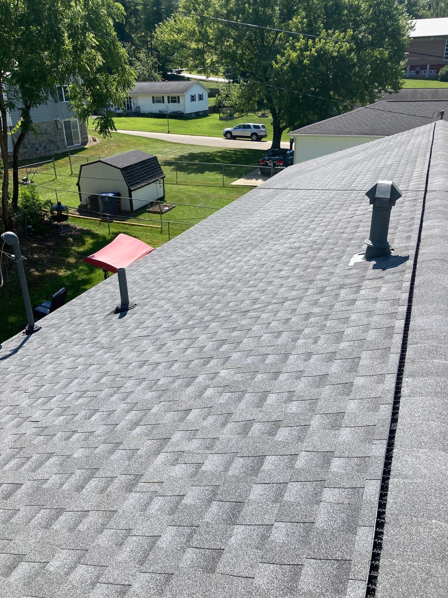 Residential Roofing Installation using GAF Timberline HDZ Oyster Grey by Rainstoppers Roofing