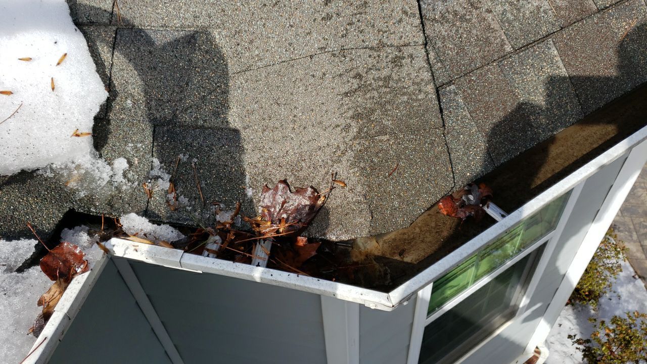 Gutter Cleaning using water by Power Wash Masters LLC