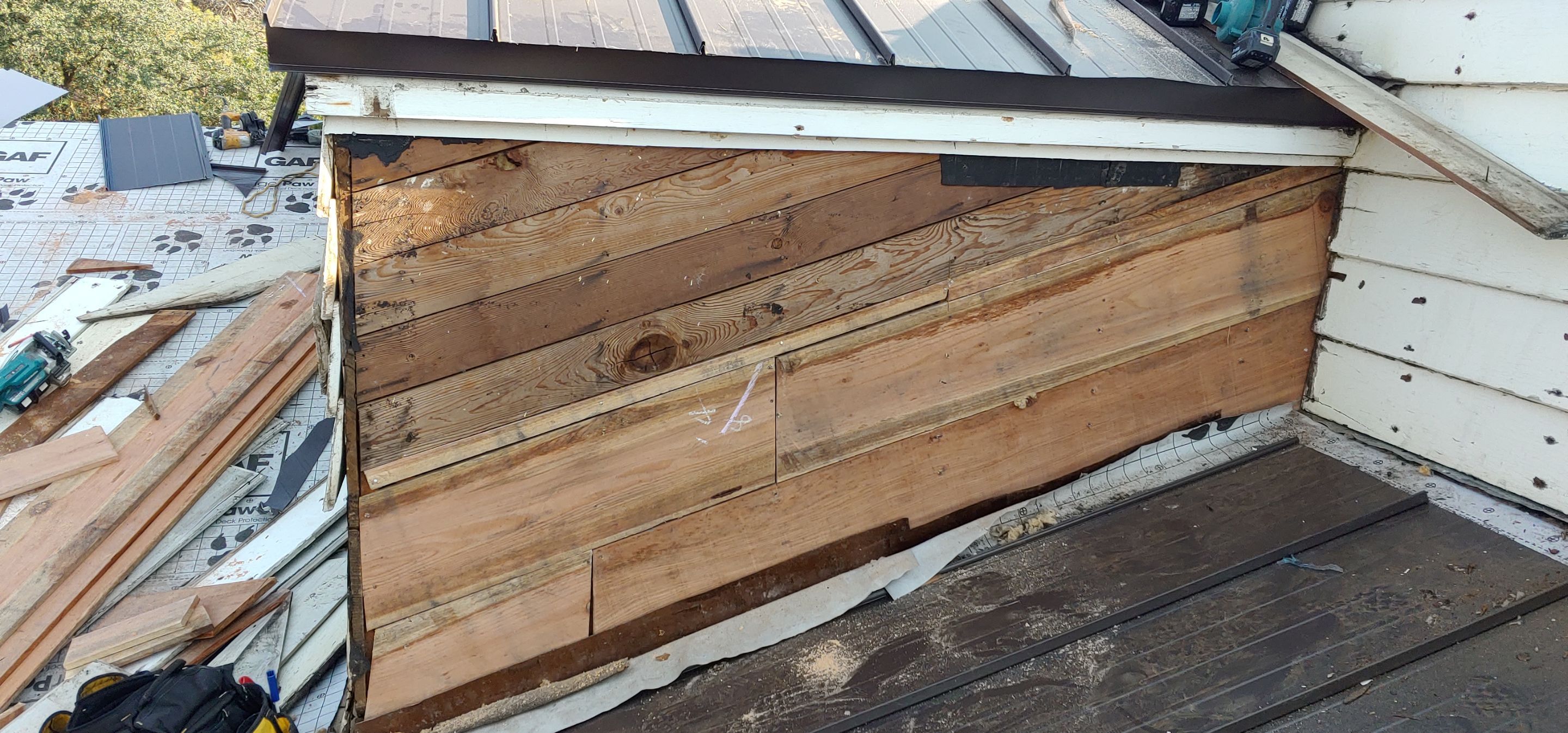 Residential Roofing Installation using Standing seam metal roofing system by Straight Edge Roofing Inc