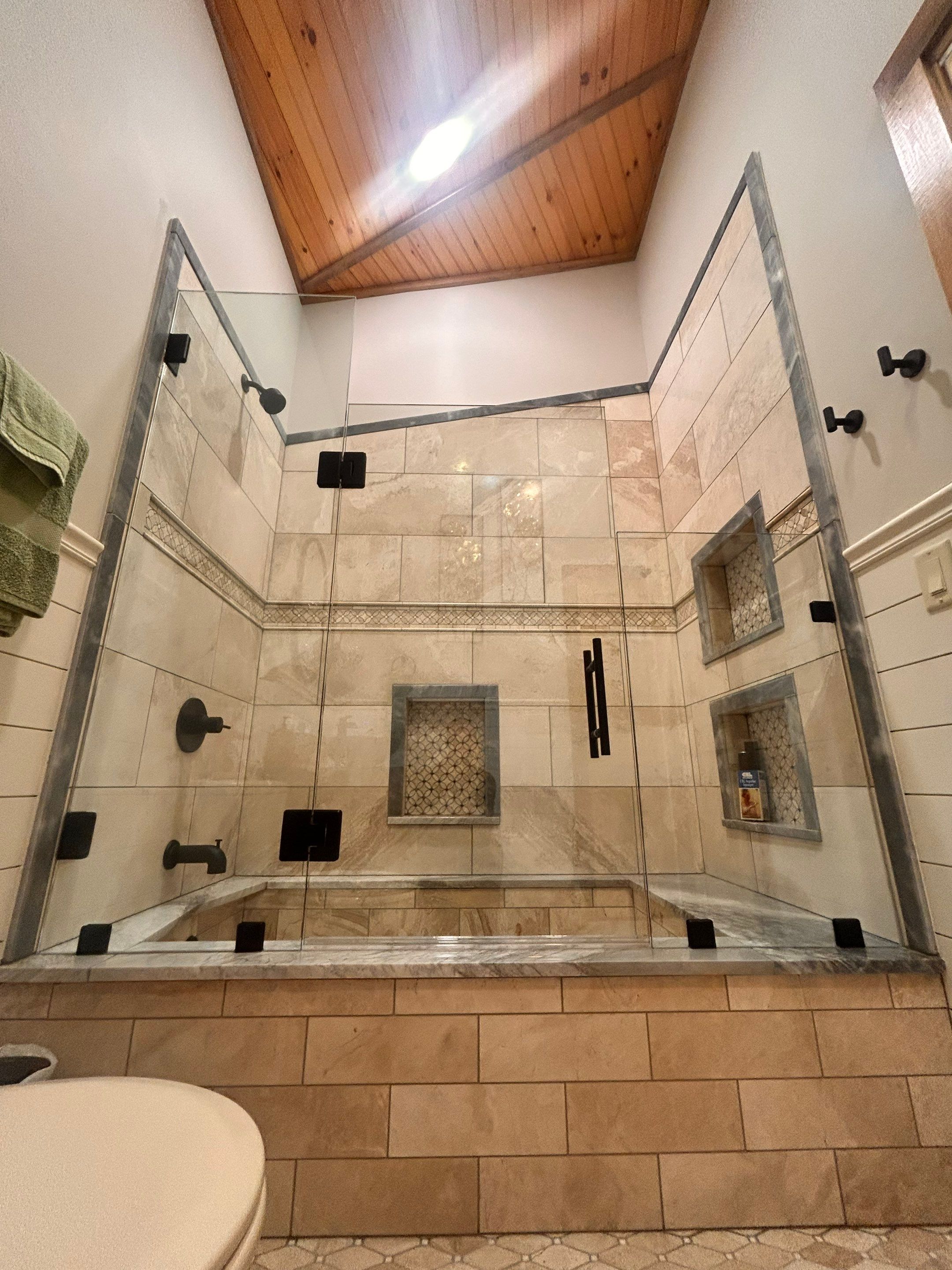 Frameless Tub Enclosure using Tempered Shower Glass by Cheshire Glass Company