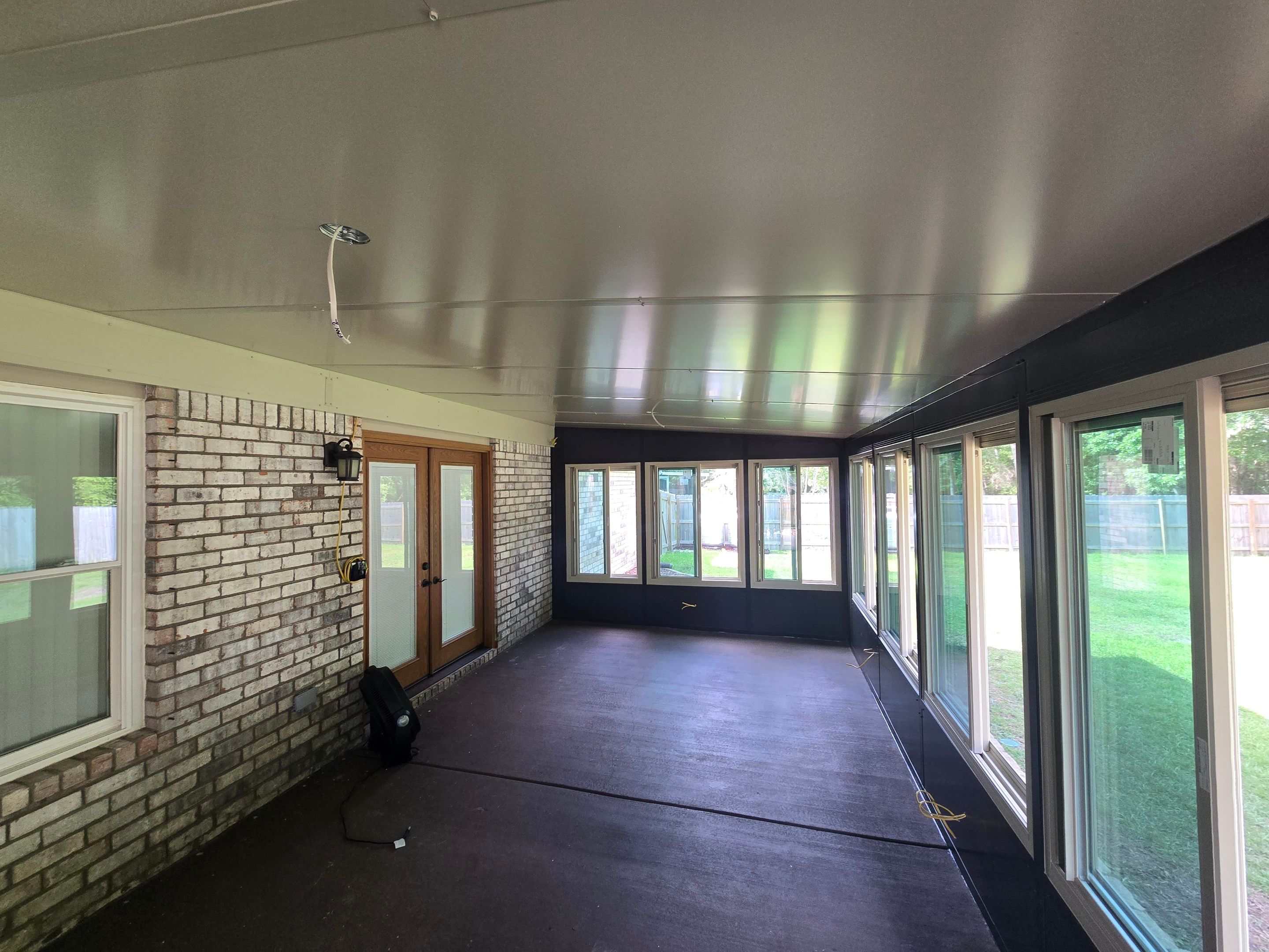 Glass Room & Patio Cover using Colorbeam by Titan Sunrooms