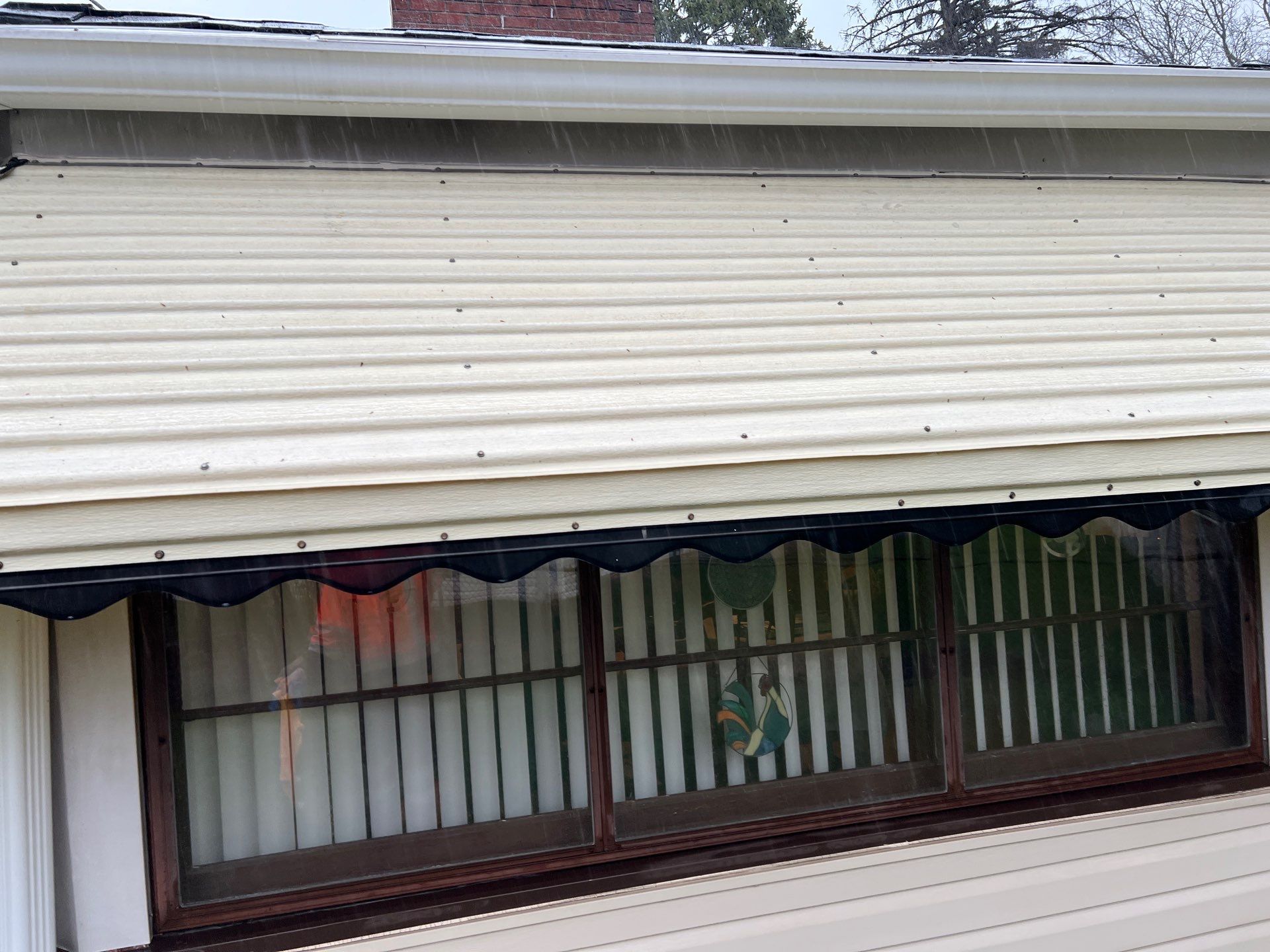 Housewashing  using Algaecide, soft wash soap by Northern Power Washing LLC.