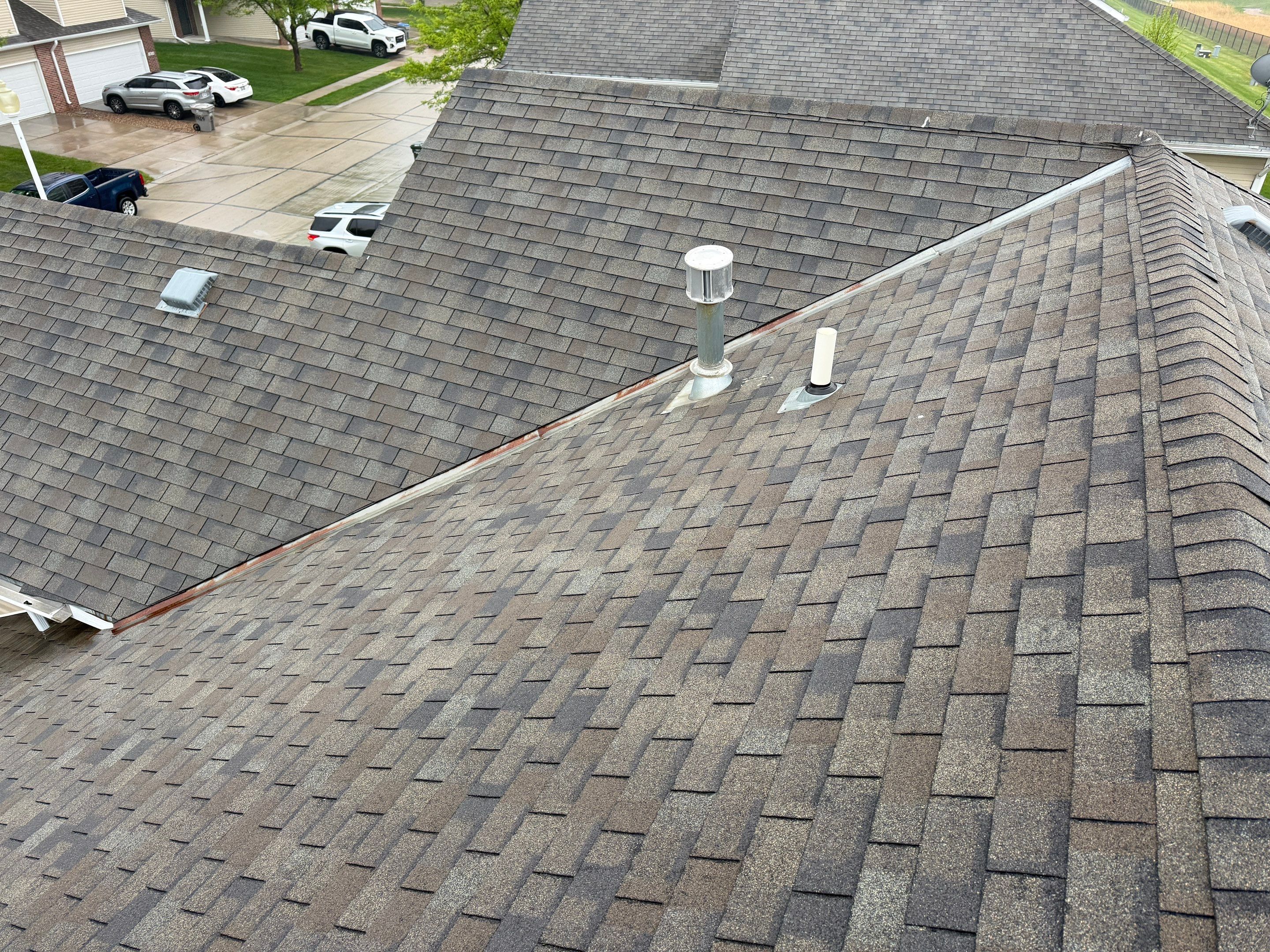 Residential Architectural Shingle Roof Replacement and Gutter Upgrade in Lincoln by Star Home