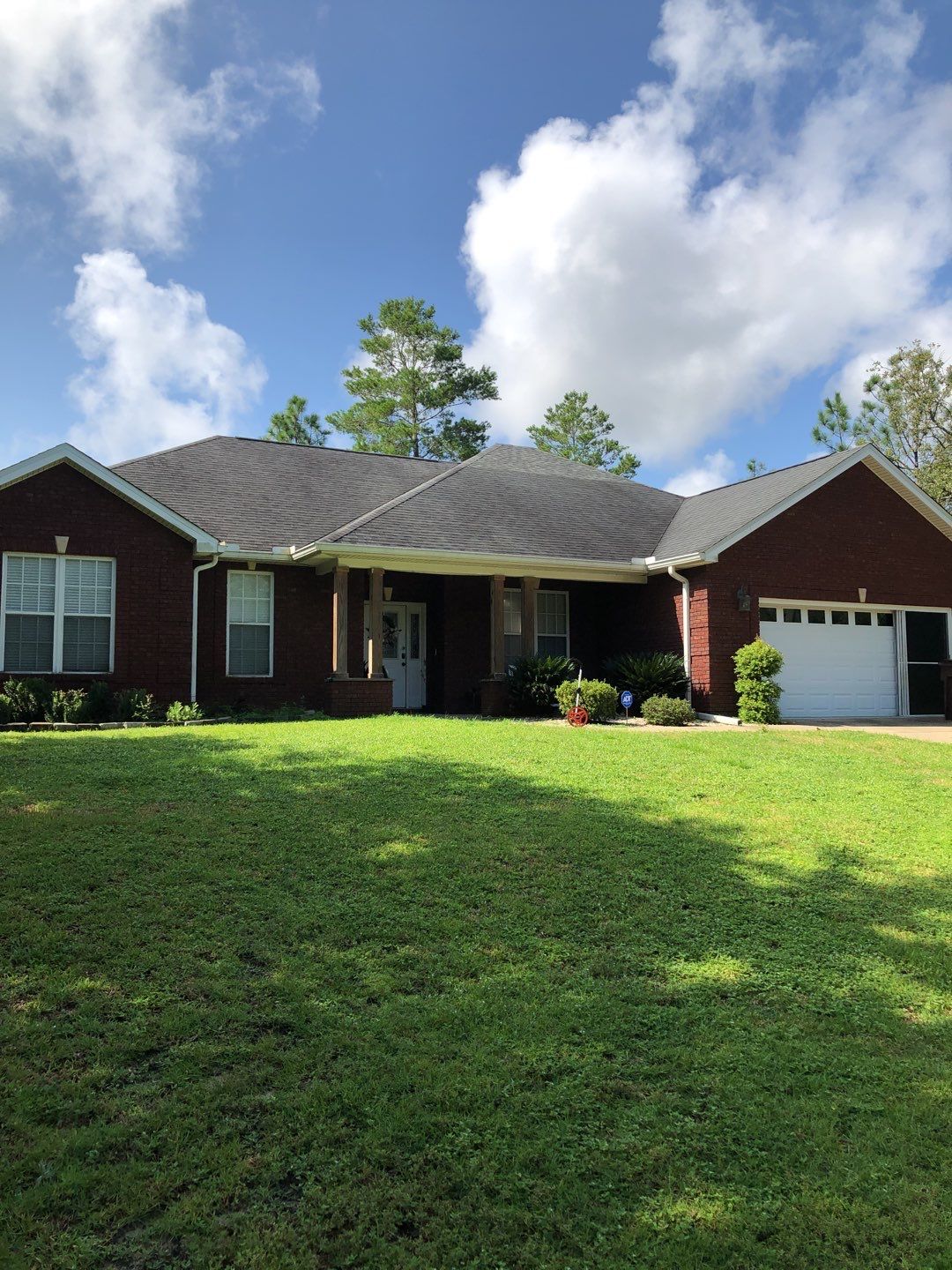 Gutter Installation using White K-Style Seamless Gutters by Gutter Professors