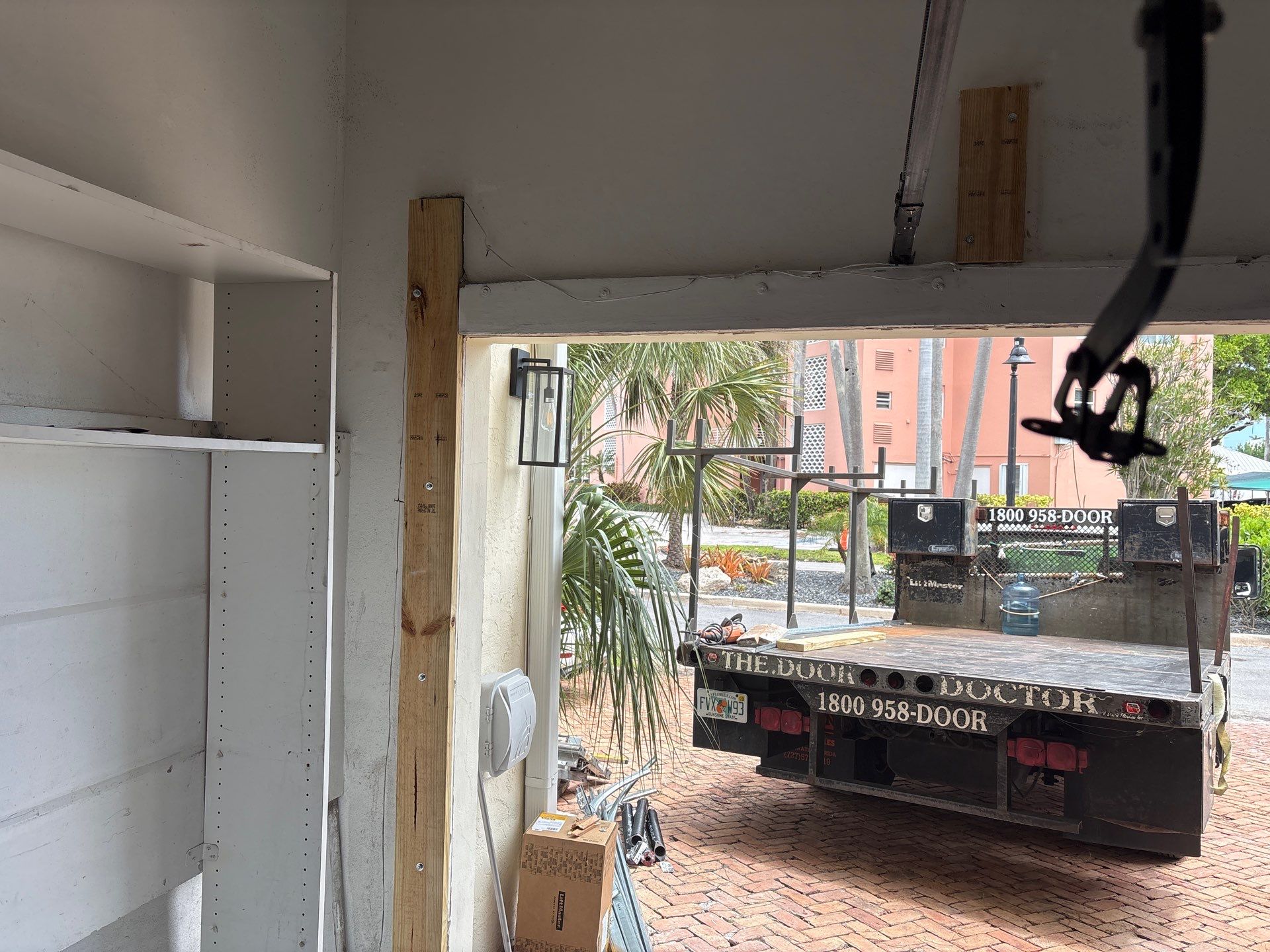 Clopay Modern Steel Garage Door Installation in Fort Lauderdale by The Door Doctor of South Florida, Inc.