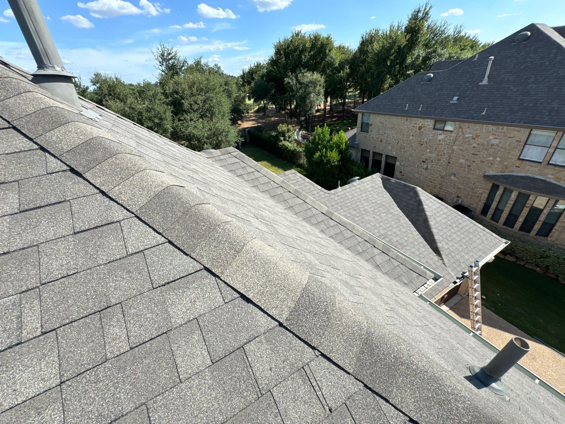 Residential Roofing Installation using IKO, Cambridge in Weathered Wood by Oakwood Roofing and Construction, LLC