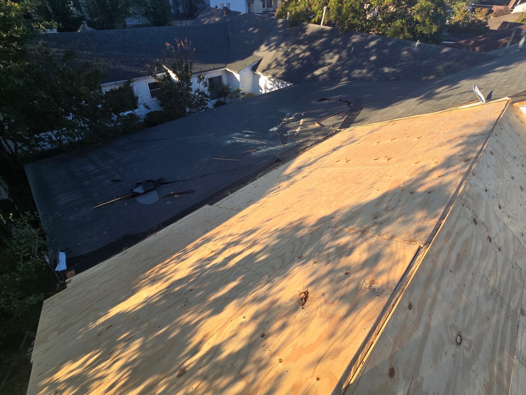 Architectural Asphalt Shingle Roof Replacement and Decking at Memphis Commercial Building by Revival Roofing Services