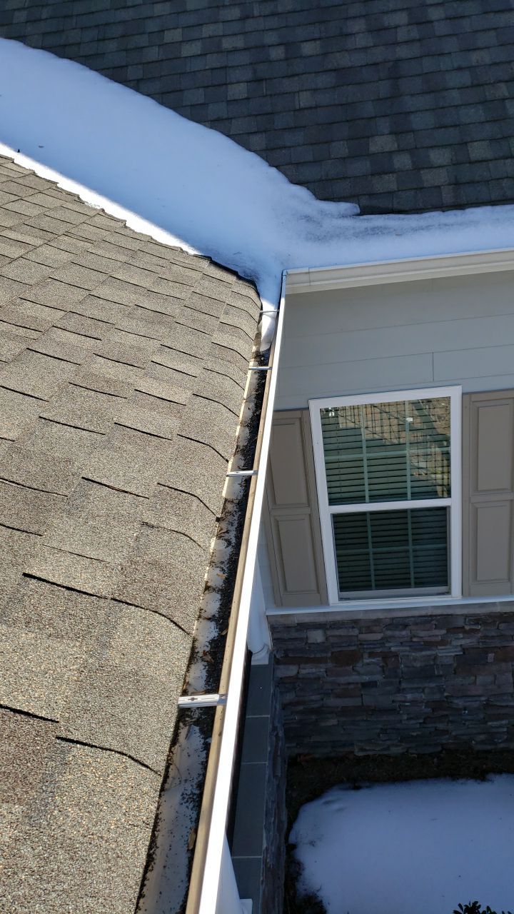 Gutter Cleaning using water by Power Wash Masters LLC