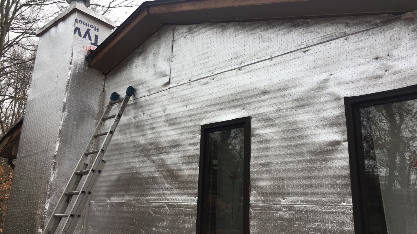 Siding Replacement by American Home Contractors
