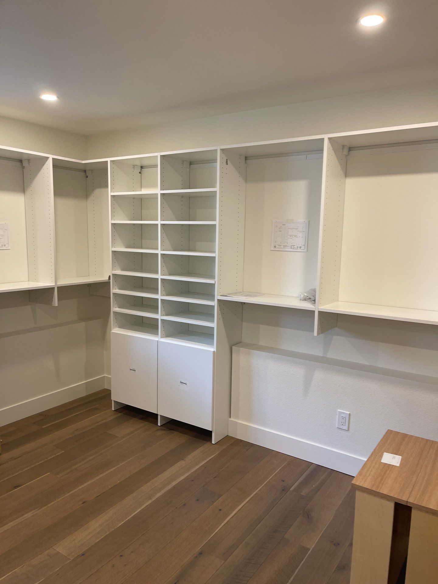 Two-Tone Walk-In Closet in Boulder by Concept 32, Inc.