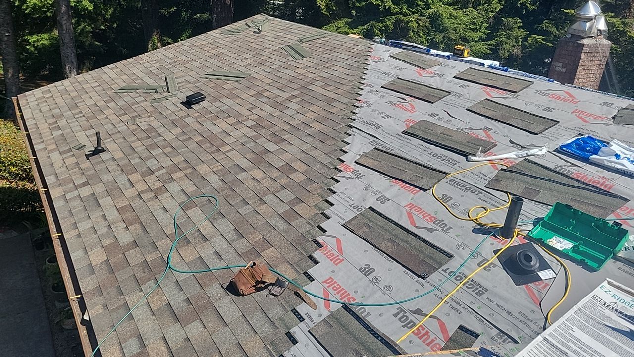 Residential Roofing Installation using Malarkey Highlander with GAF 60mil TPO by Orezona Building & Roofing Company, Inc.
