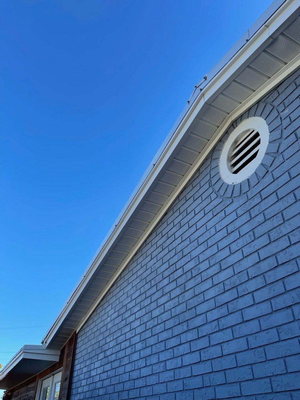 Gutter Installation using K-Style Seamless Gutters and Soffit and Fascia Replacement by Gutter Professors