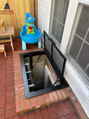 Custom Iron Window Well Cover with Lift System – Residential – Montgomery Village, MD