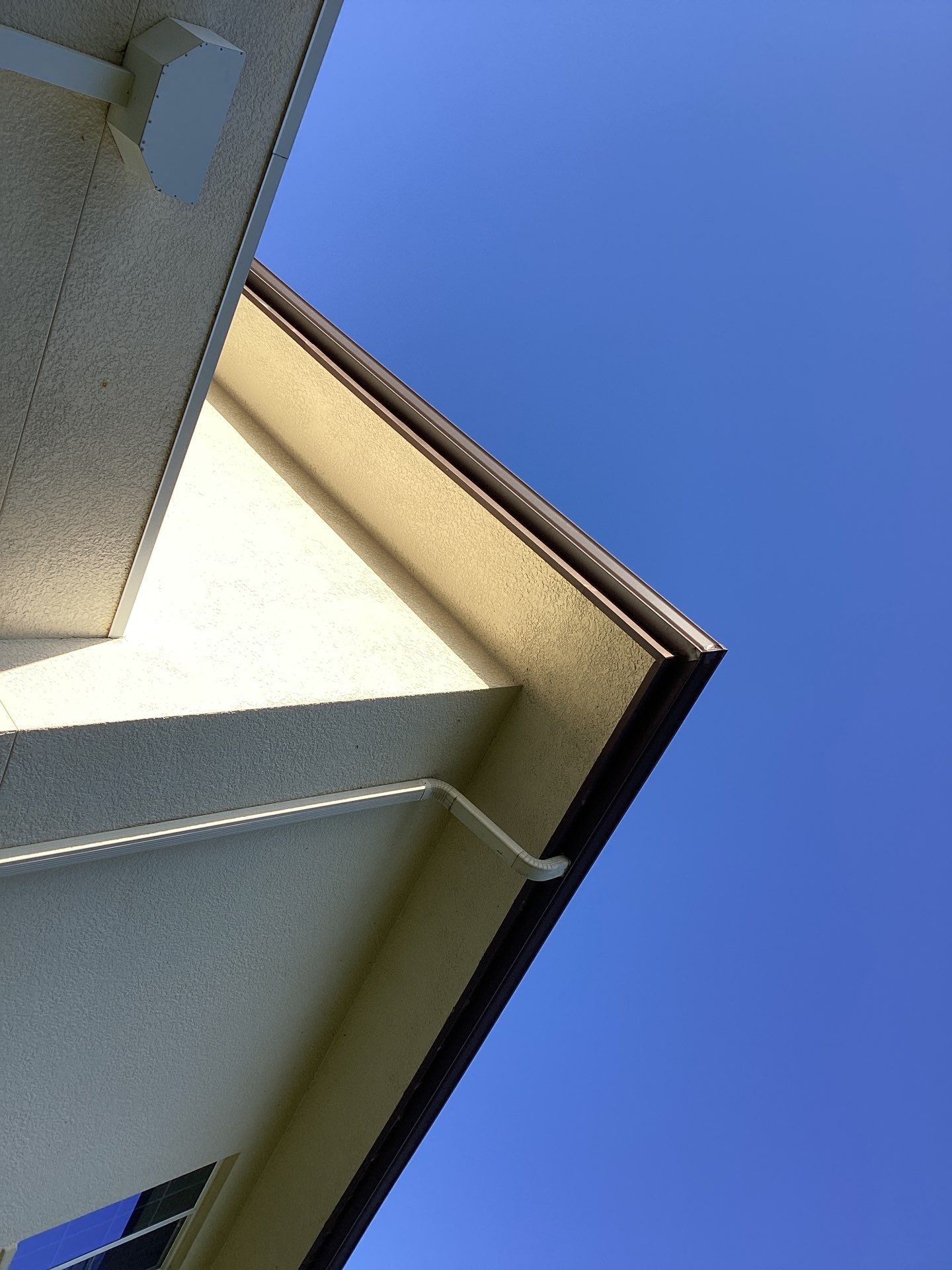 Musket Brown Seamless Gutters using Musket Brown Seamless Gutters in Capen Coral FL by Gutter Professors